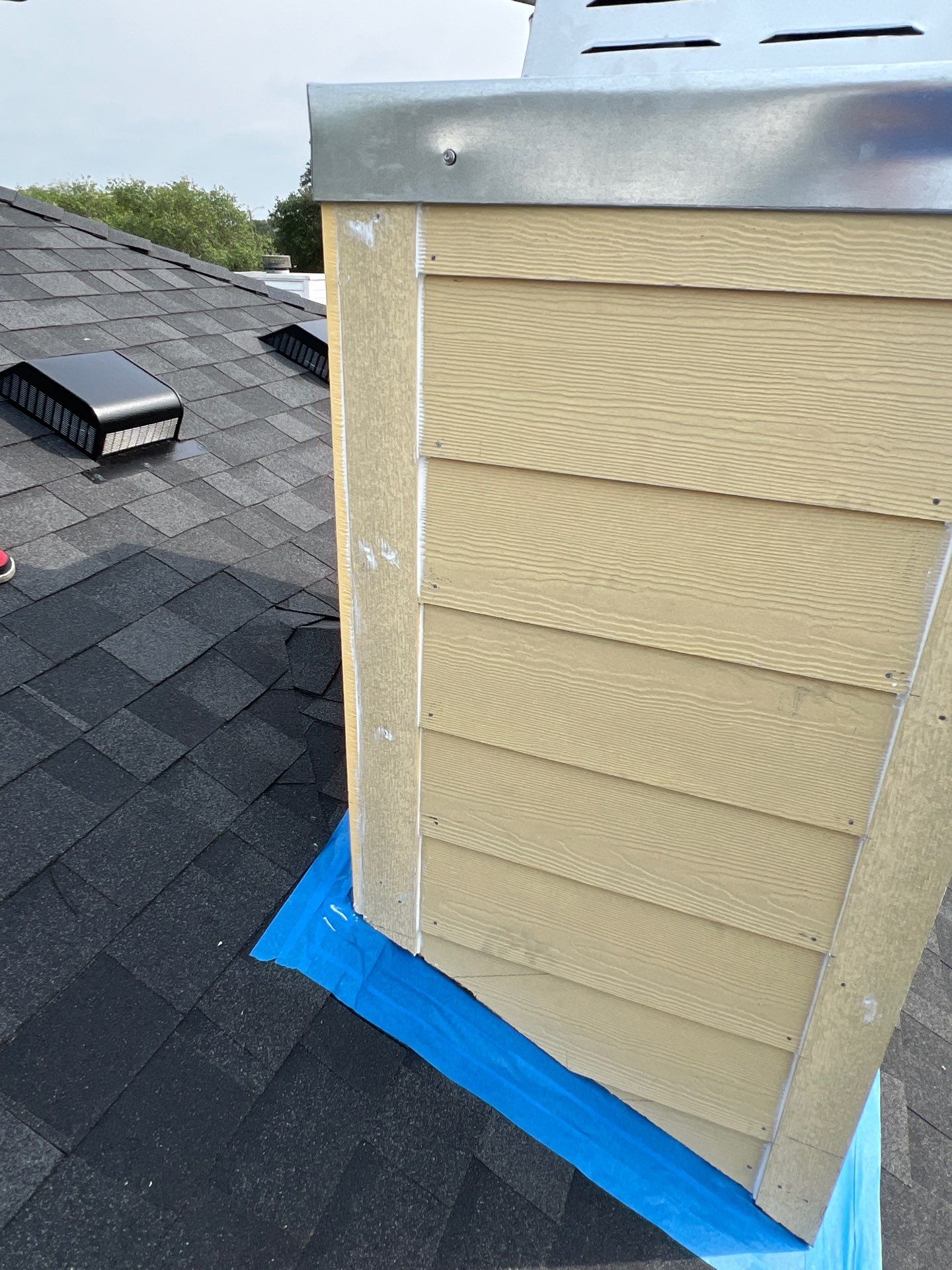 Nothing looks nicer than a little black roof by Bayfront Roofing and Construction