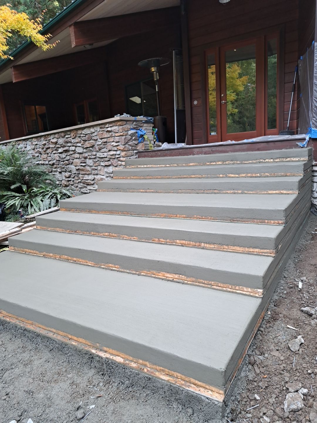 Pia | Custom Concrete Driveway, Walkway & Floating Steps by Jireh Asphalt & Concrete Inc 