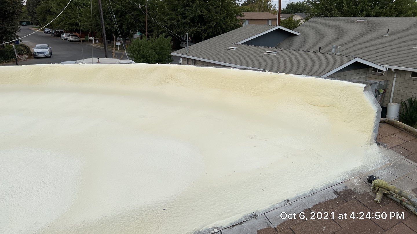 Residential Roofing Installation using Spray foam roofing insulation and General Coatings acrylic coatings by Straight Edge Roofing Inc