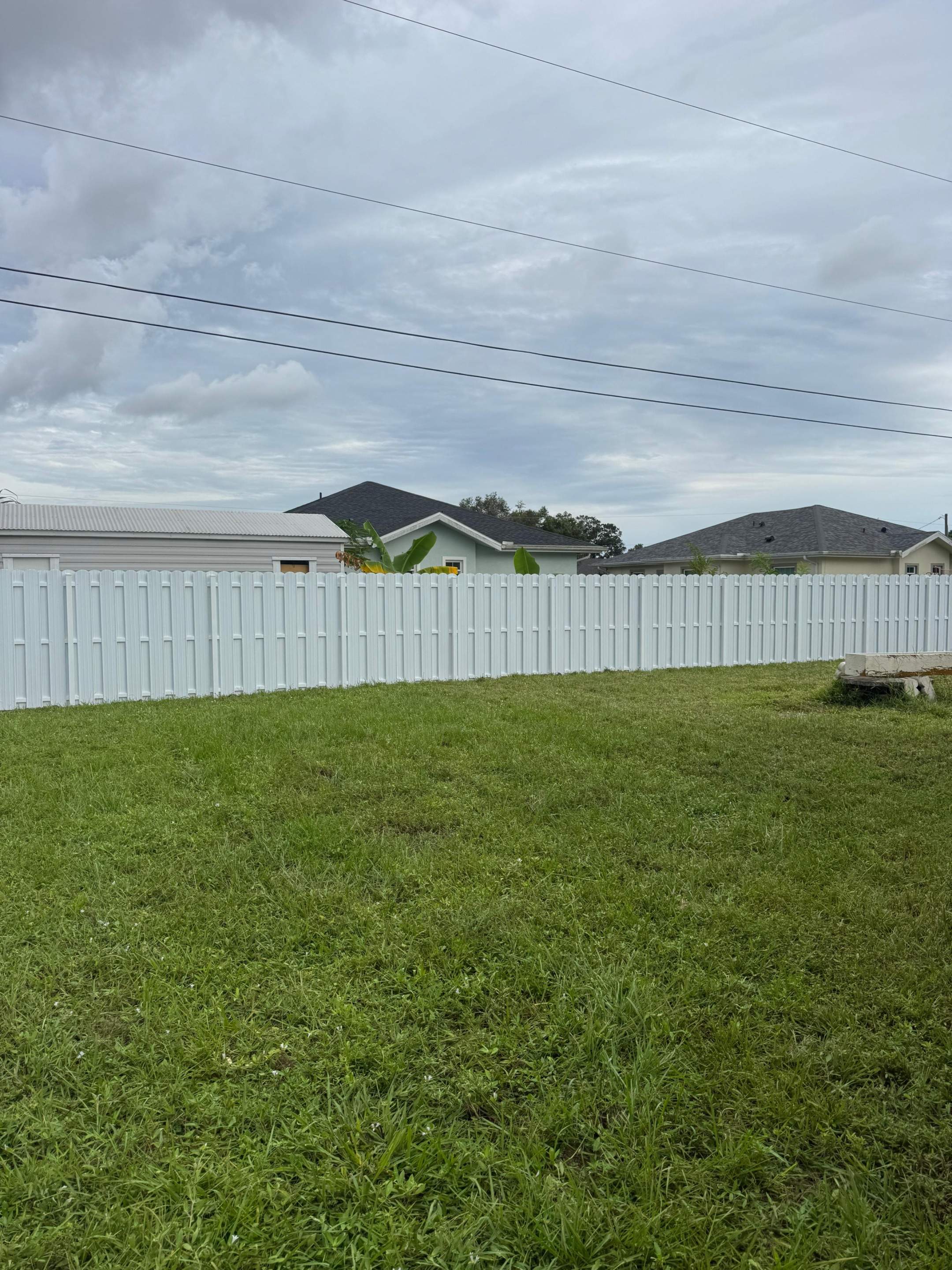 White Vinyl Privacy Fence Installation in North Port by True Fence LLC