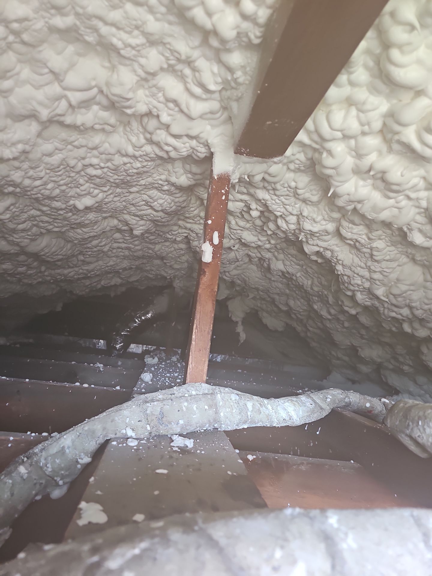 Attic Insulation using open cell spray foam by NYS Foam & Energy