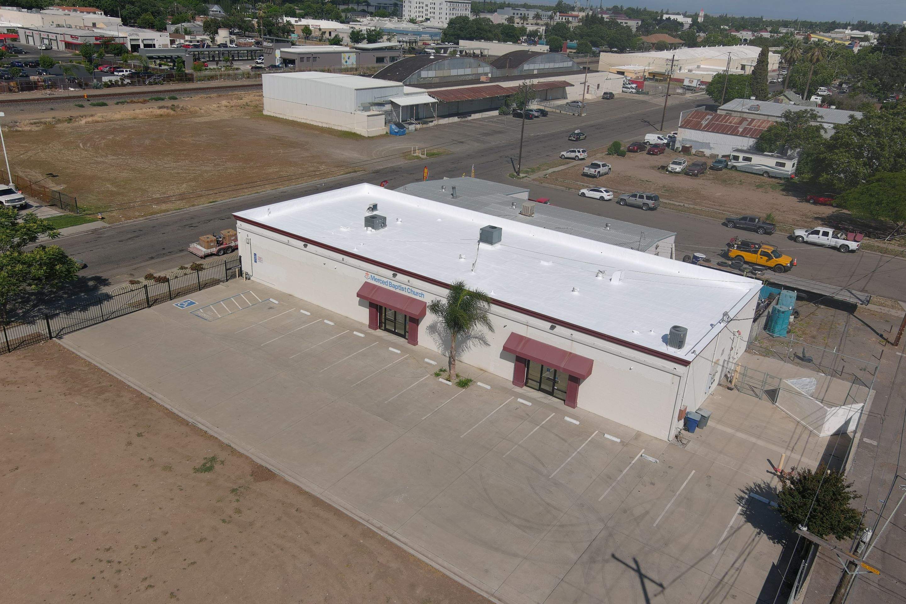 Spray foam and coatings using Conklin Benchmark/PUMA XL coatings and spray foam by Straight Edge Roofing Inc