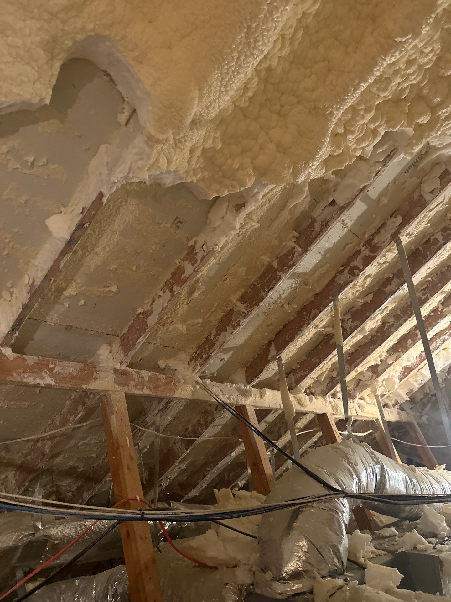 Spray foam insulation removal & re spray by Apex Insulation Solutions