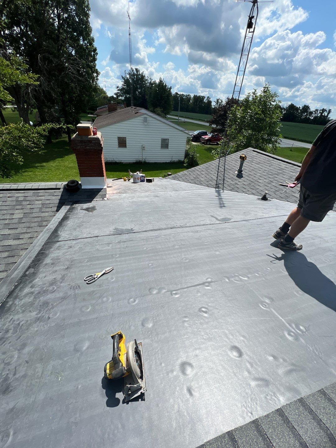 Residential Roofing Installation using 60 mil rubber roof  by Nitro Roofing and Construction