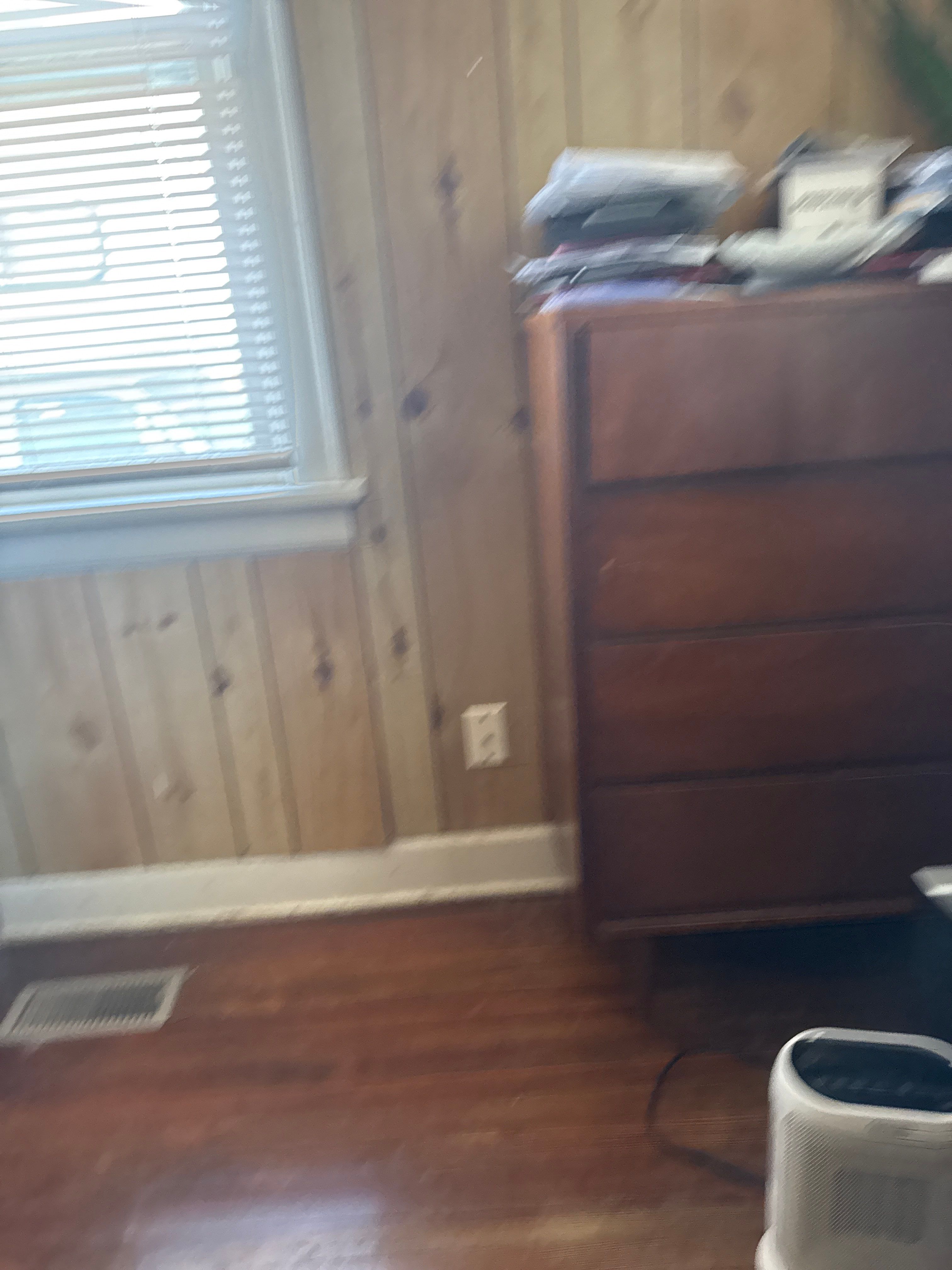 Commercial Office Remodel Featuring Knotty Pine Paneling and Hardwood Floors by CompanyCam Sales Demo