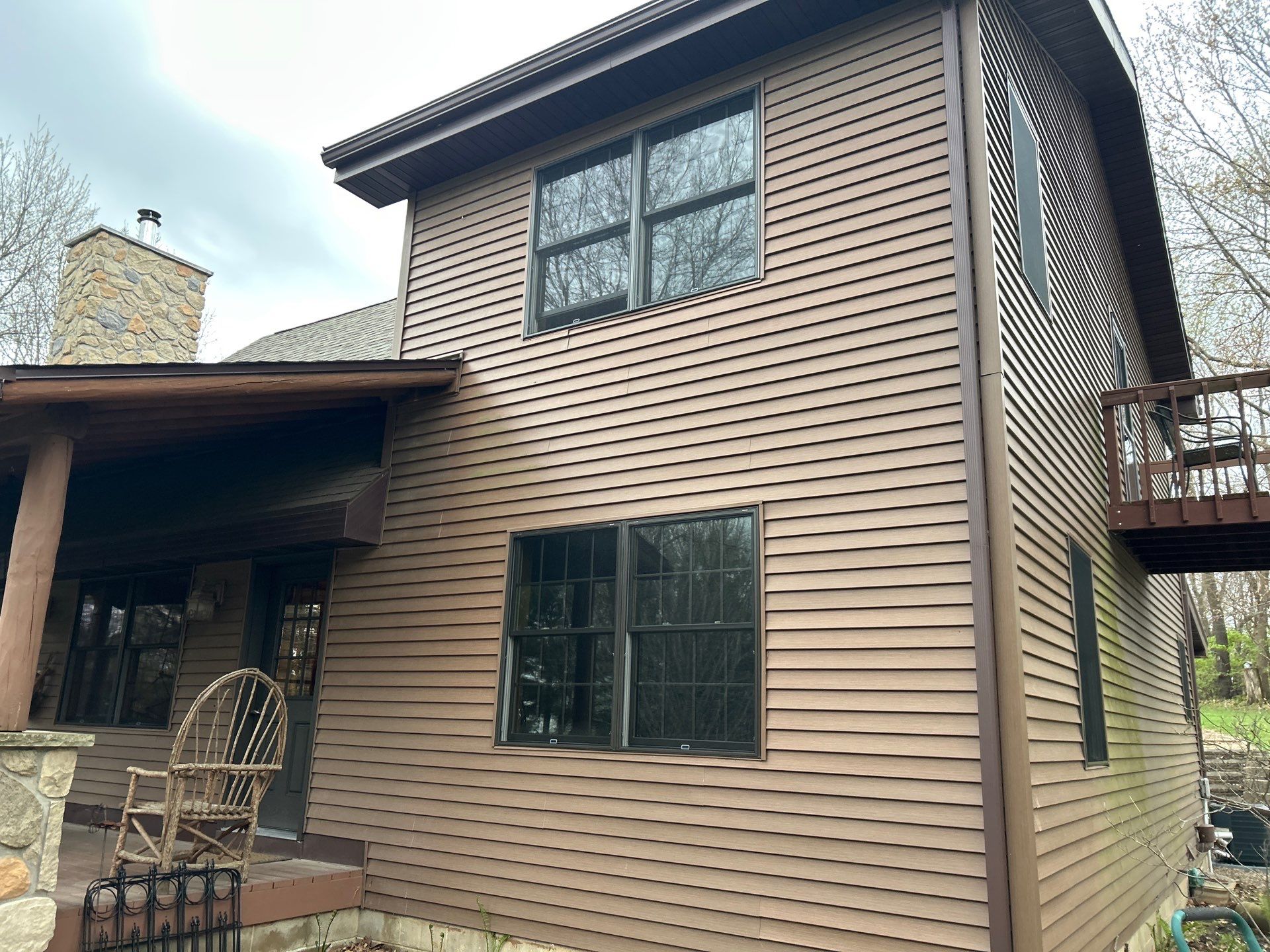 Pella Window installation using Pella Lifestyle wood/Aluminum window by United Windows and Siding LLC