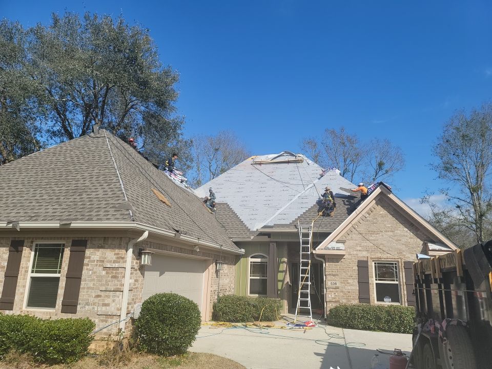 Residential Roofing Installation using Roof Replacement by American Roofing & Construction LLC