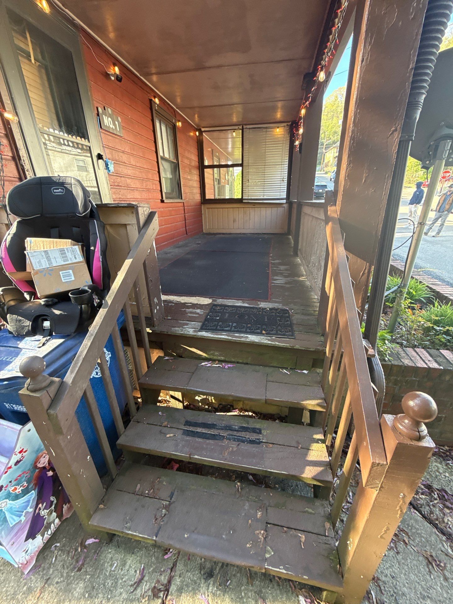 Roof sunspace deck  by Cousins Roofing Siding & Decks