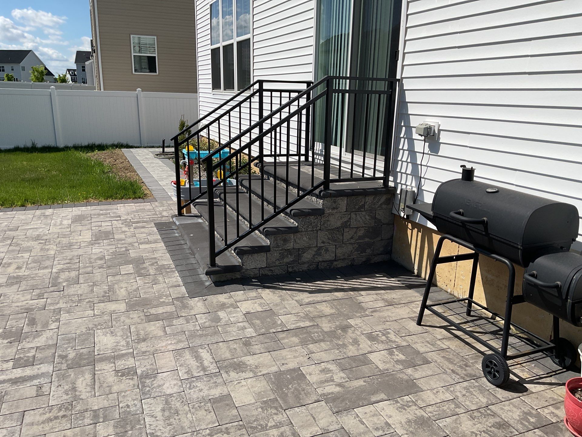 Custom Belgard Paver Patio Design & Installation in Delaware by Studio G Indoor Spaces & Outdoor Living