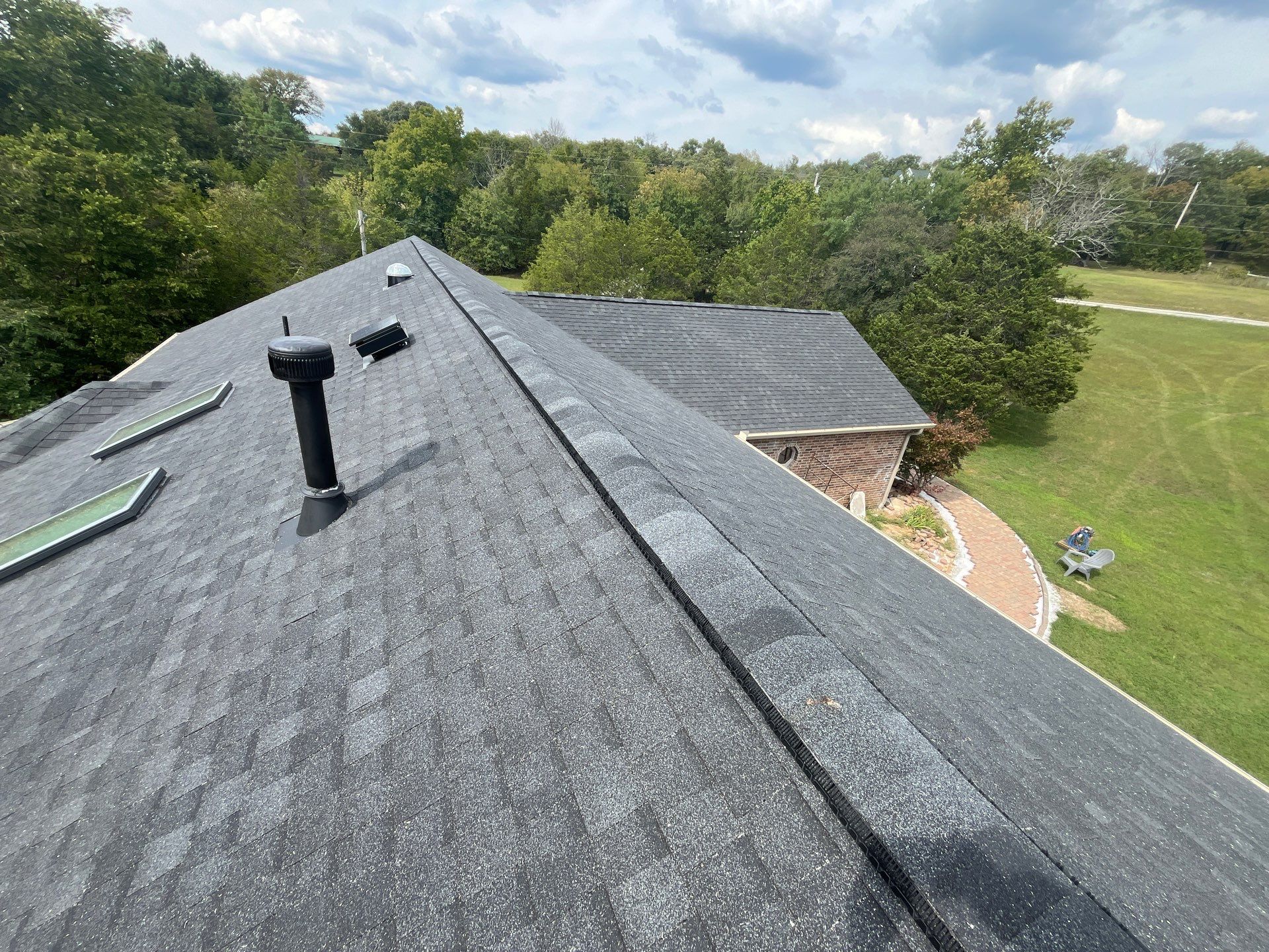 Residential Roofing + Gutters & Downspouts Install  by Titan Commercial & Residential Roofing 