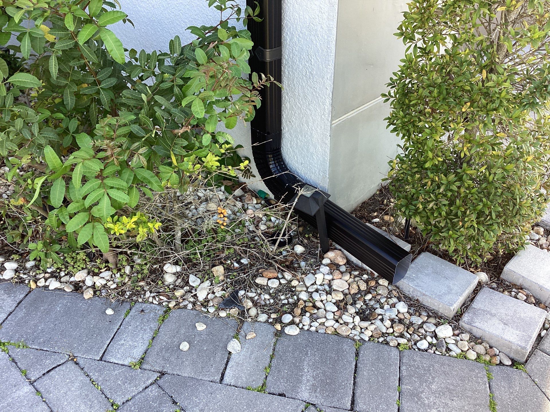 Black Seamless Gutters using 6 Inch Seamless Gutters in Cape Coral FL by Gutter Professors