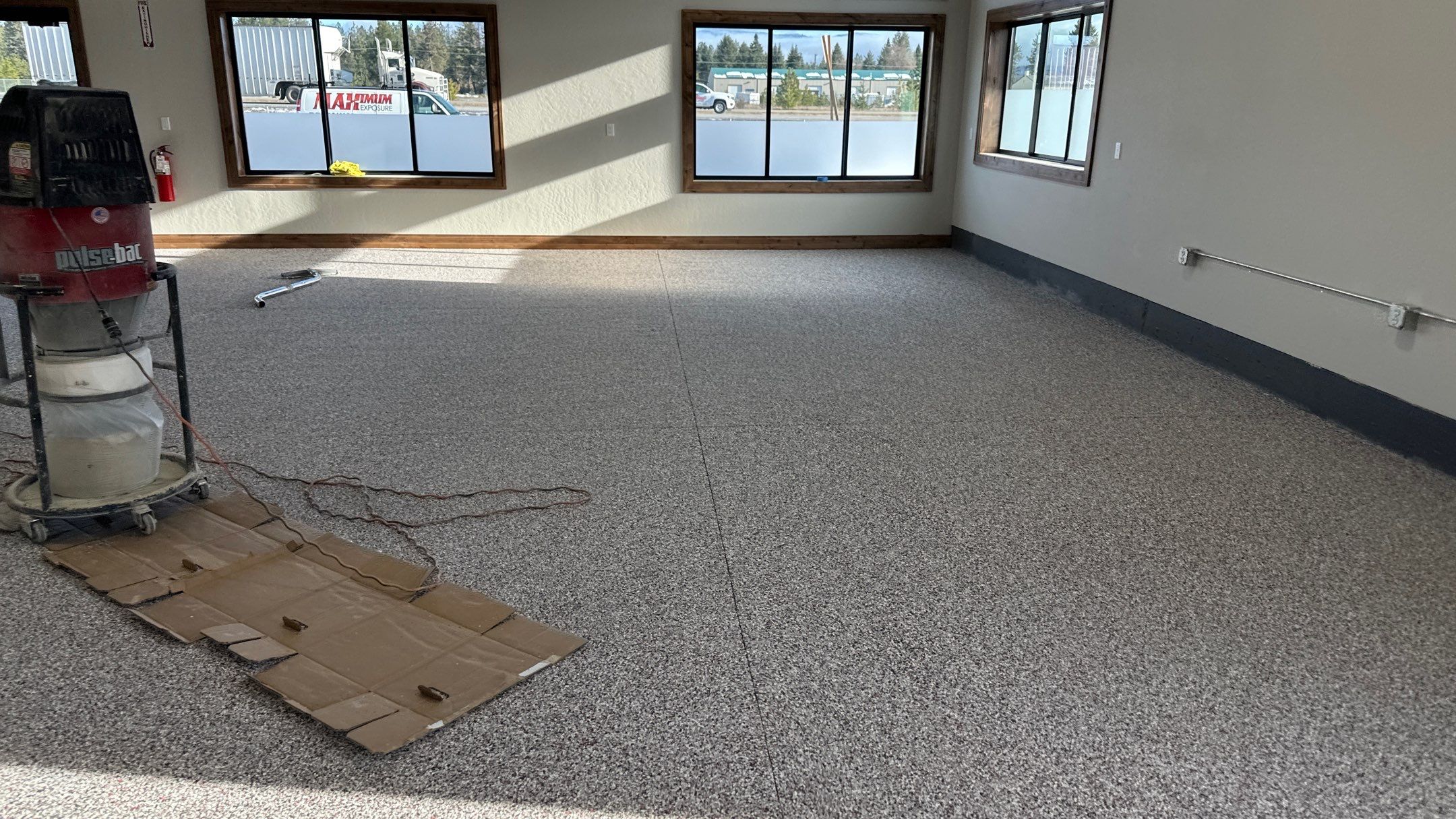 Maximum Exposure Commercial Floor using Domino w/ 5% Cherry Bomb Red  by Croc Coatings, LLC