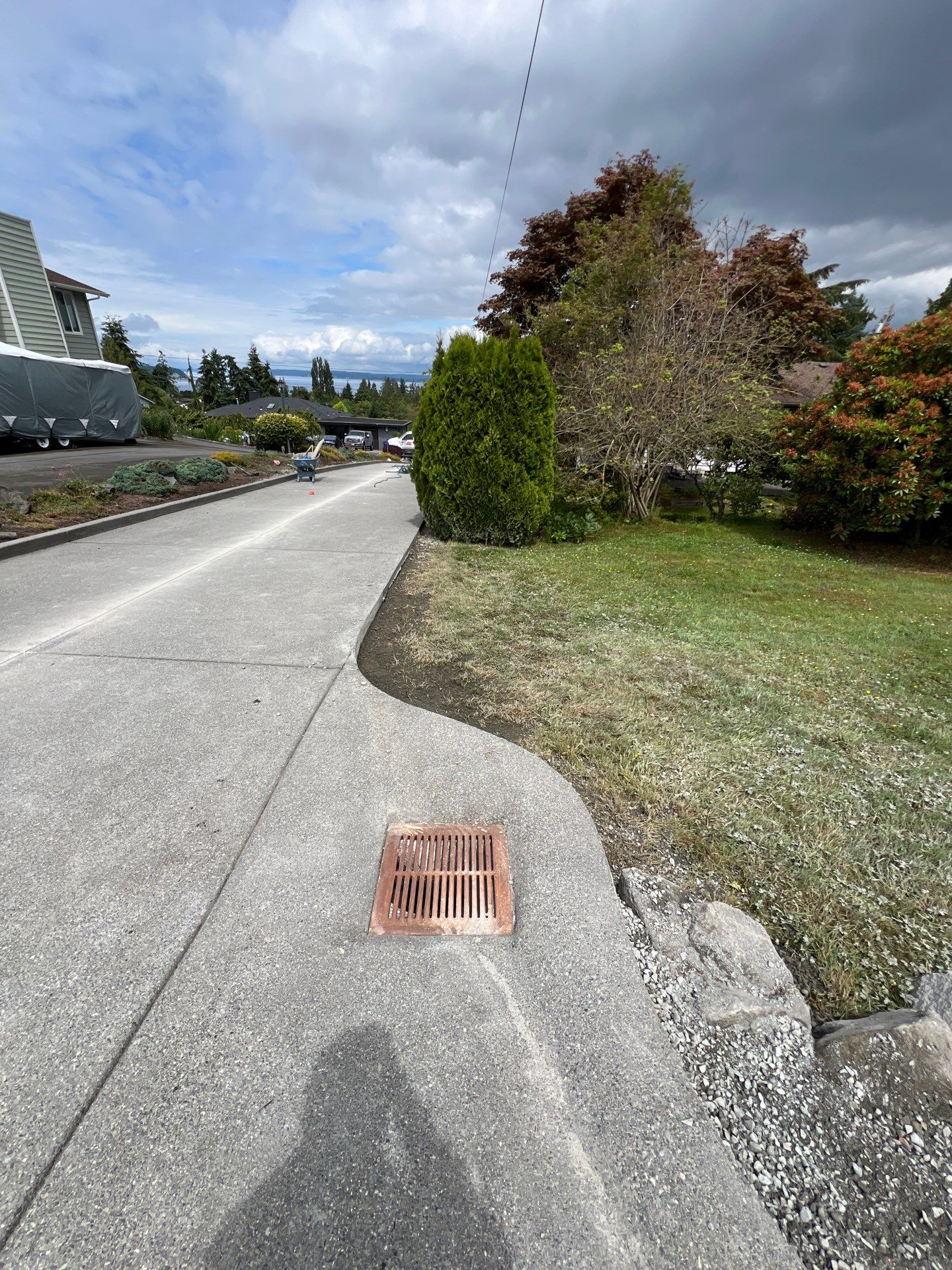 Concrete Driveway Makeover w/ Asphalt Patch | Everett  by Jireh Asphalt & Concrete Inc 