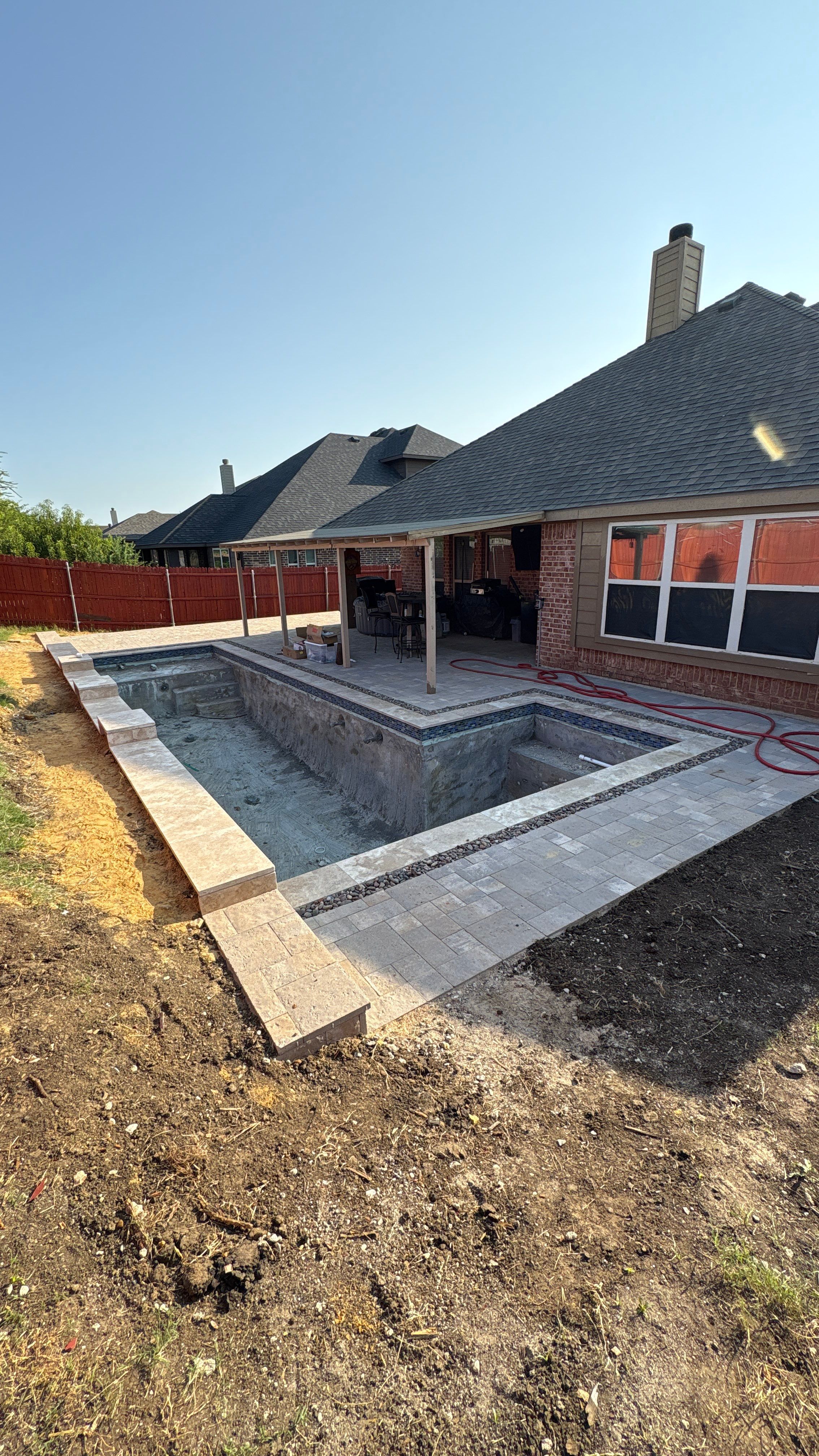 Geometric Pool with Paver Decking by Pinnacle Pools and Spas - DFW
