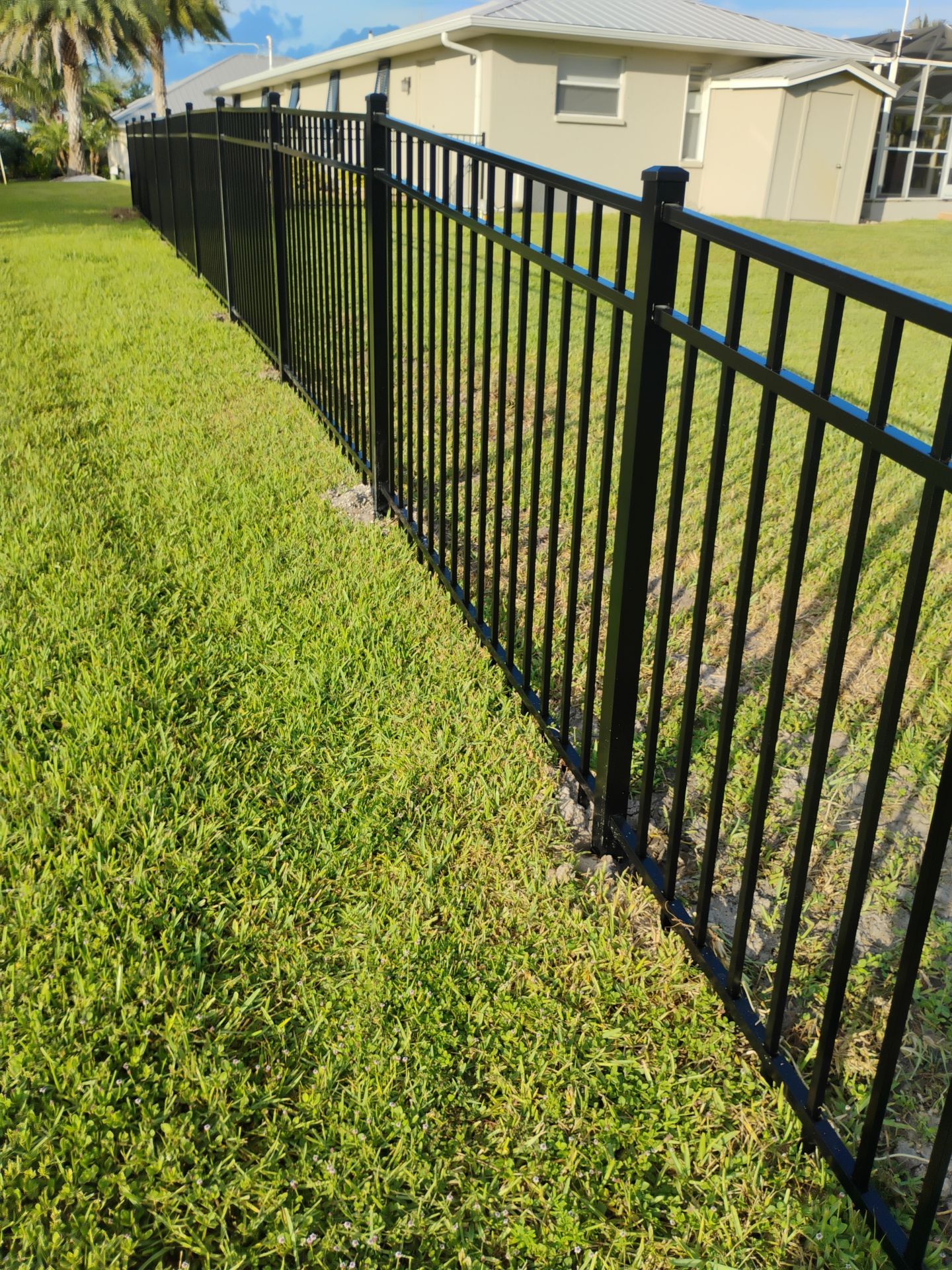 Black Aluminum Waterfront Fence Installation in Osprey by True Fence LLC