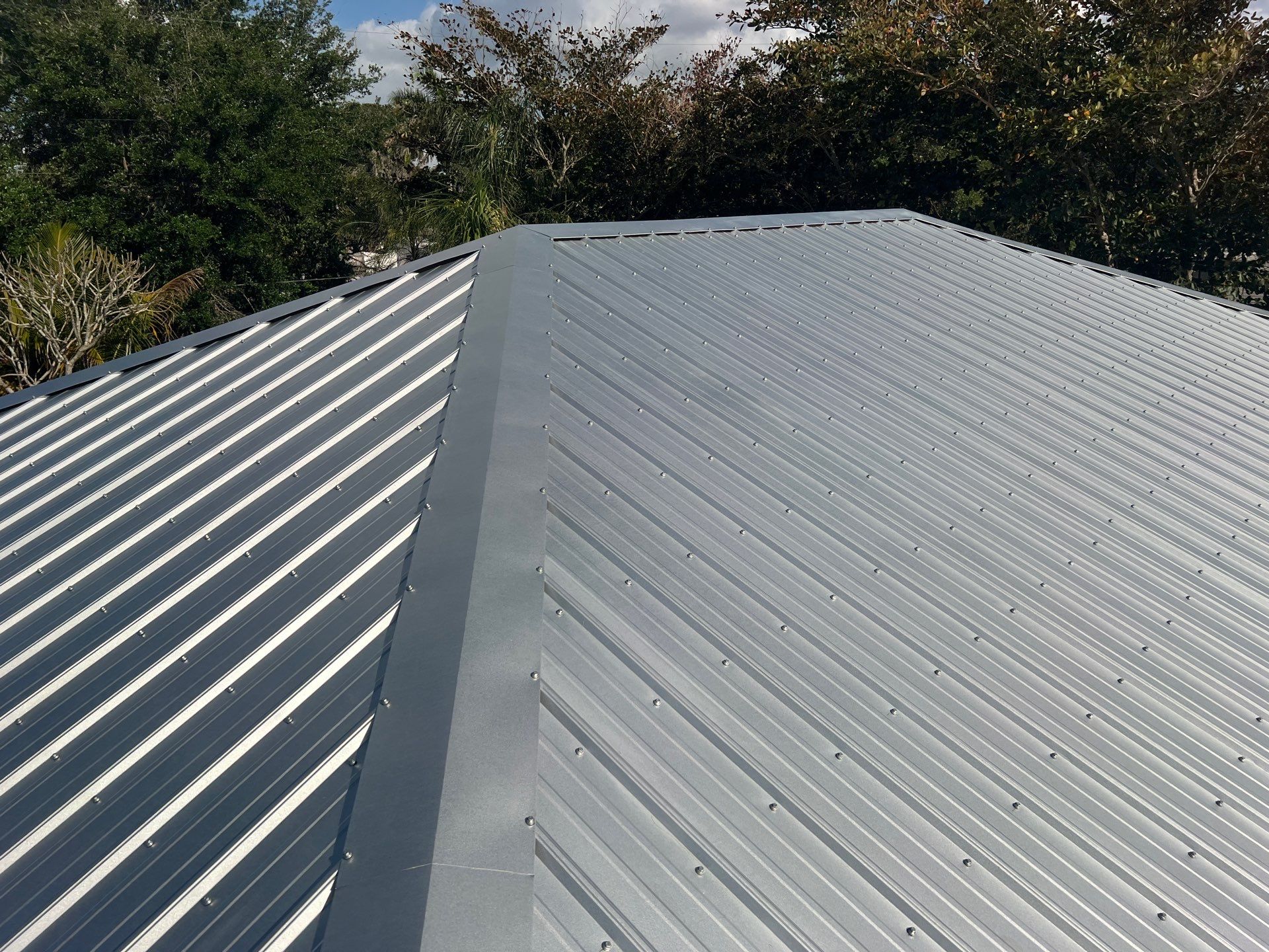 Residential Roofing Installation using Durabull Classic Rib Panel by Durabilis Roofing INC