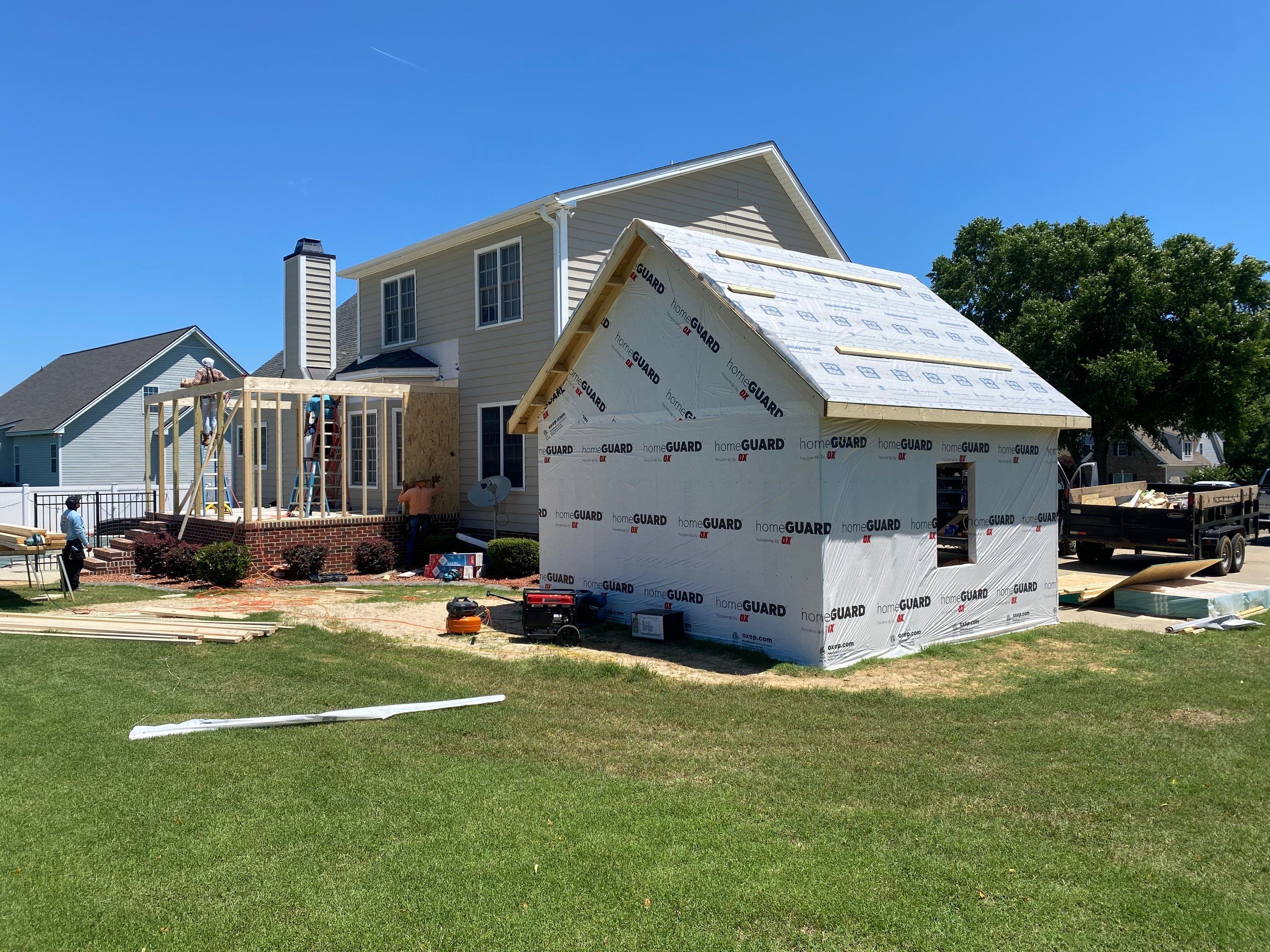Custom Screened Porch and Concrete Walkway Installation in Rocky Mount by The Remodeling Company