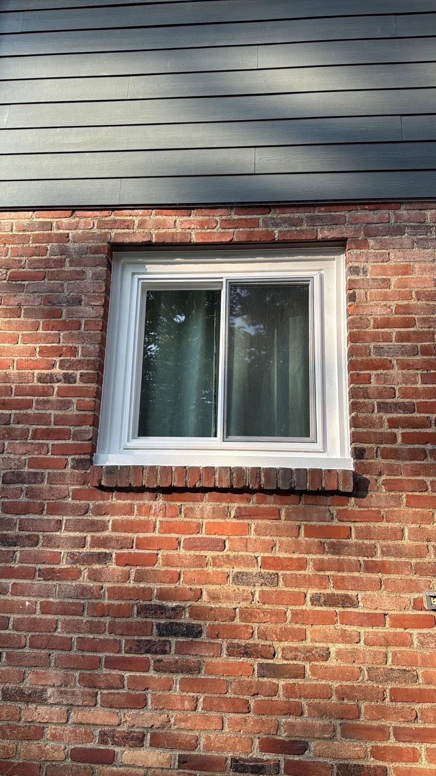 Hardie Siding and Window Project in Bridgeville by Cousins Roofing Siding & Decks