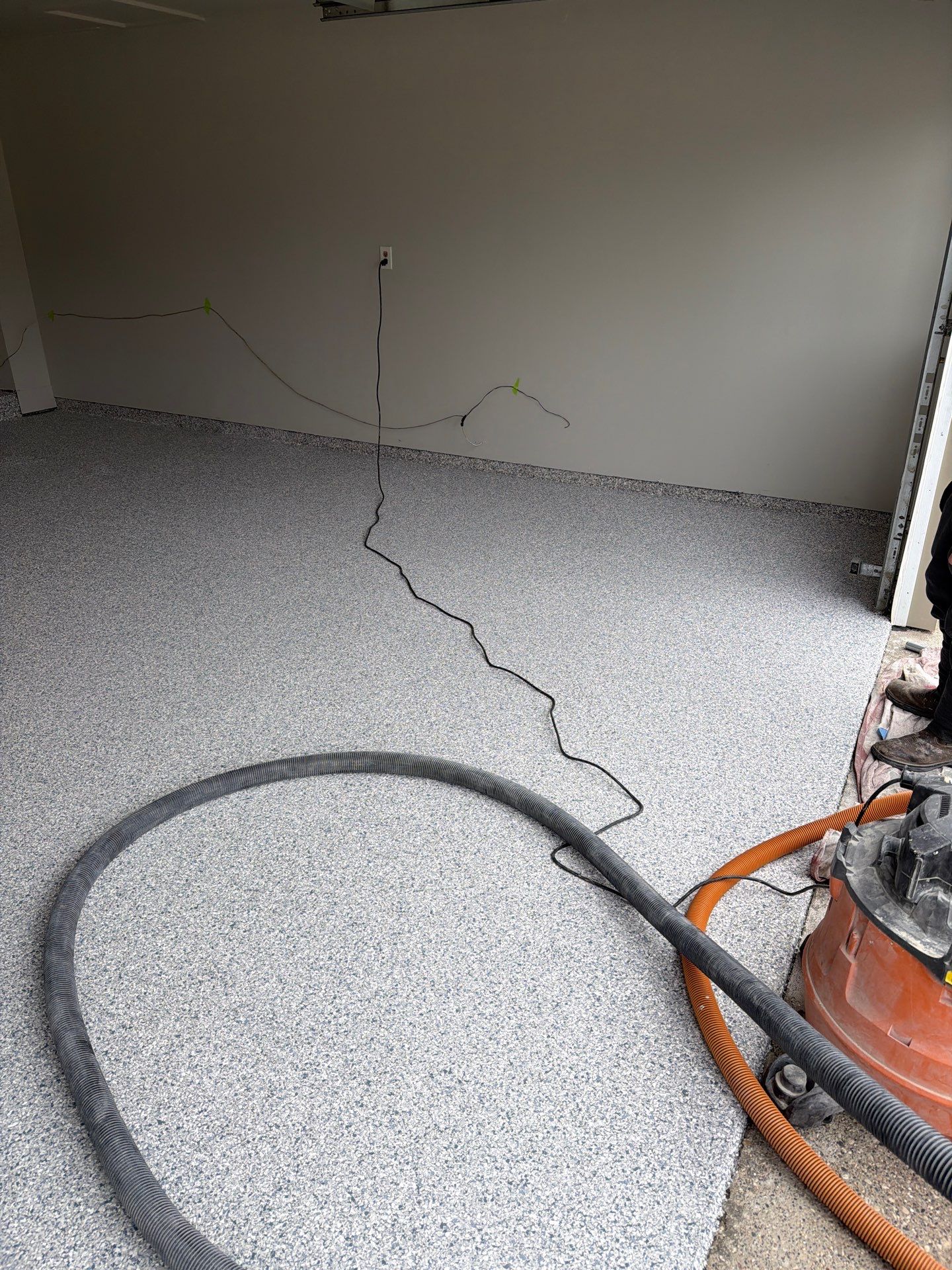 Muskegon Garage Interior Painting and Epoxy Flake Floor Installation by Gordon Painting