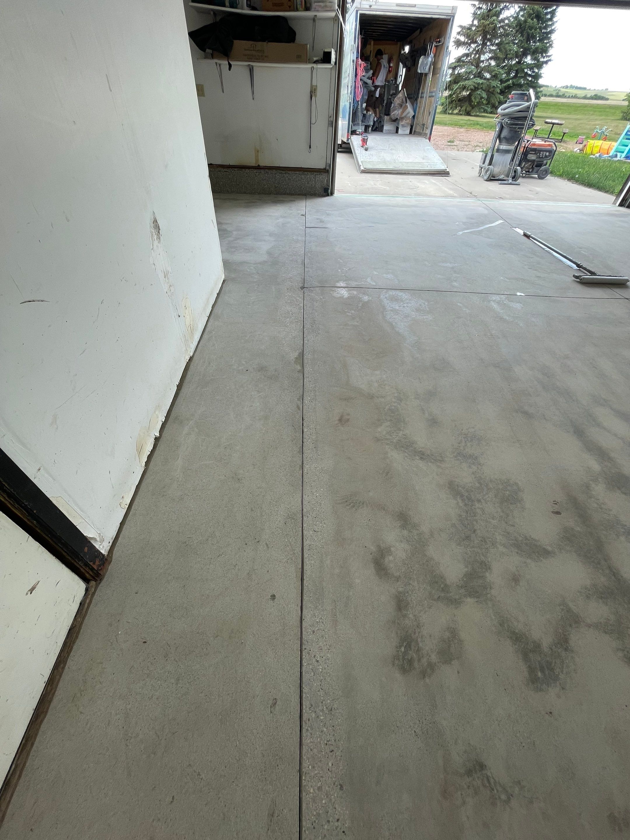 Hartford Residential Garage Floor Transformation With Decorative Chip Coating by Select Painting, Coatings & Garage Cabinets