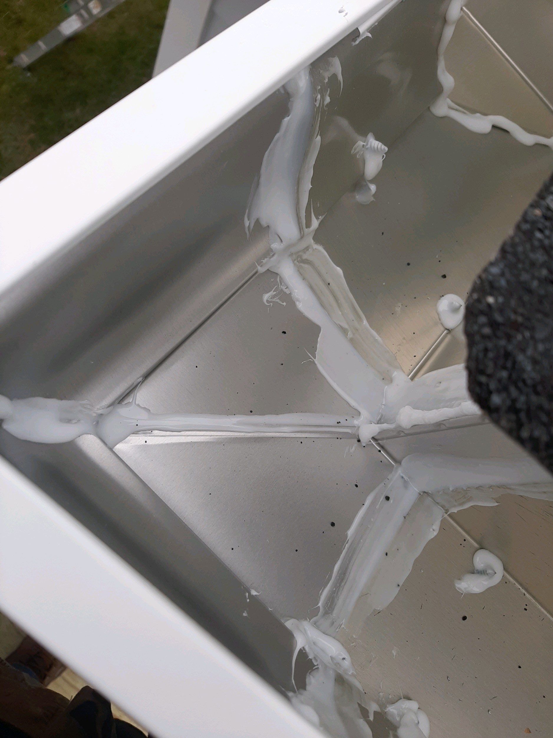 Gutter Installation using White K-Style Seamless Gutters by Gutter Professors