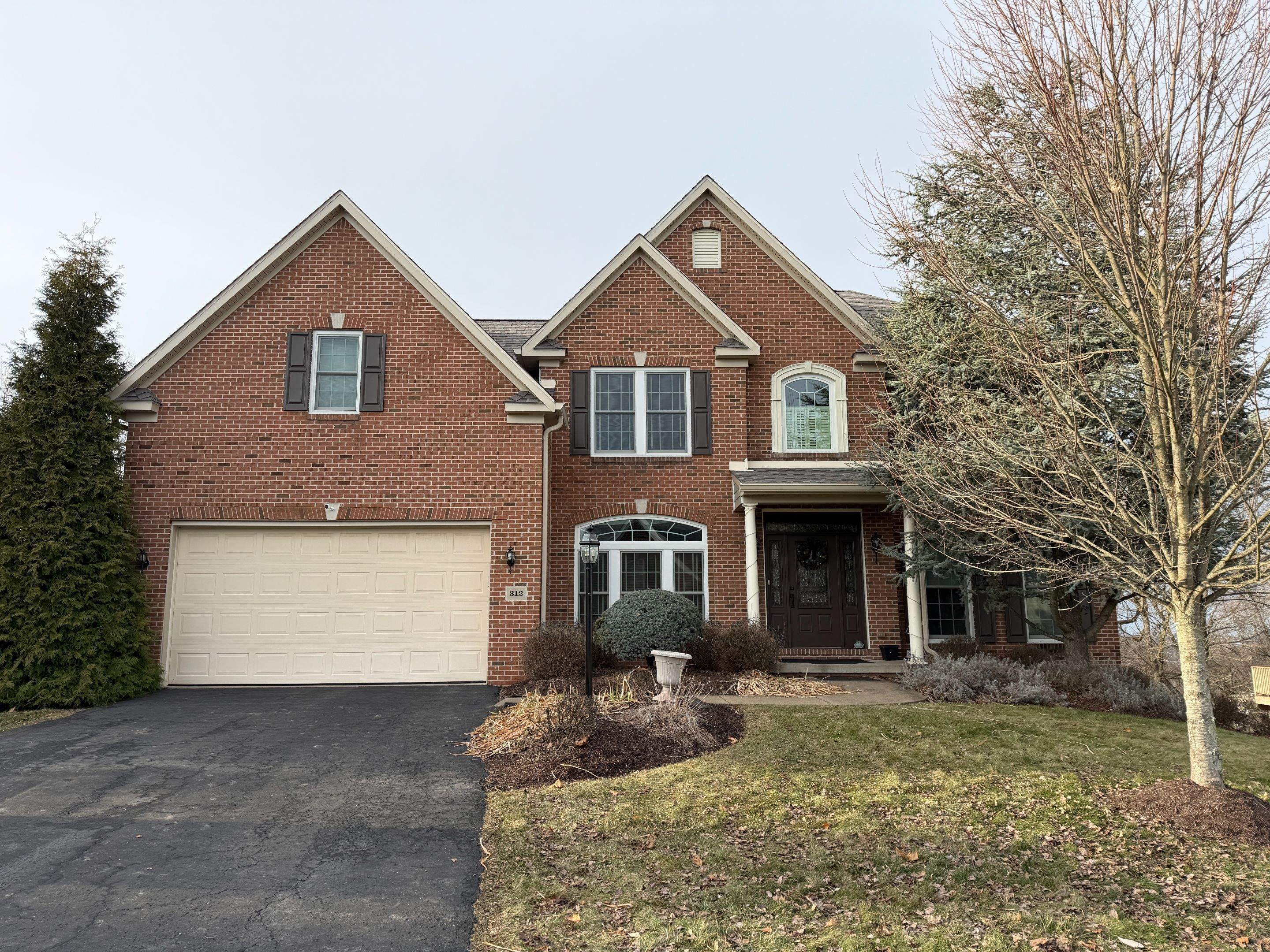 Partial Siding Renovation with Tan Vinyl Siding in Canonsburg by Ideal Siding Pittsburgh