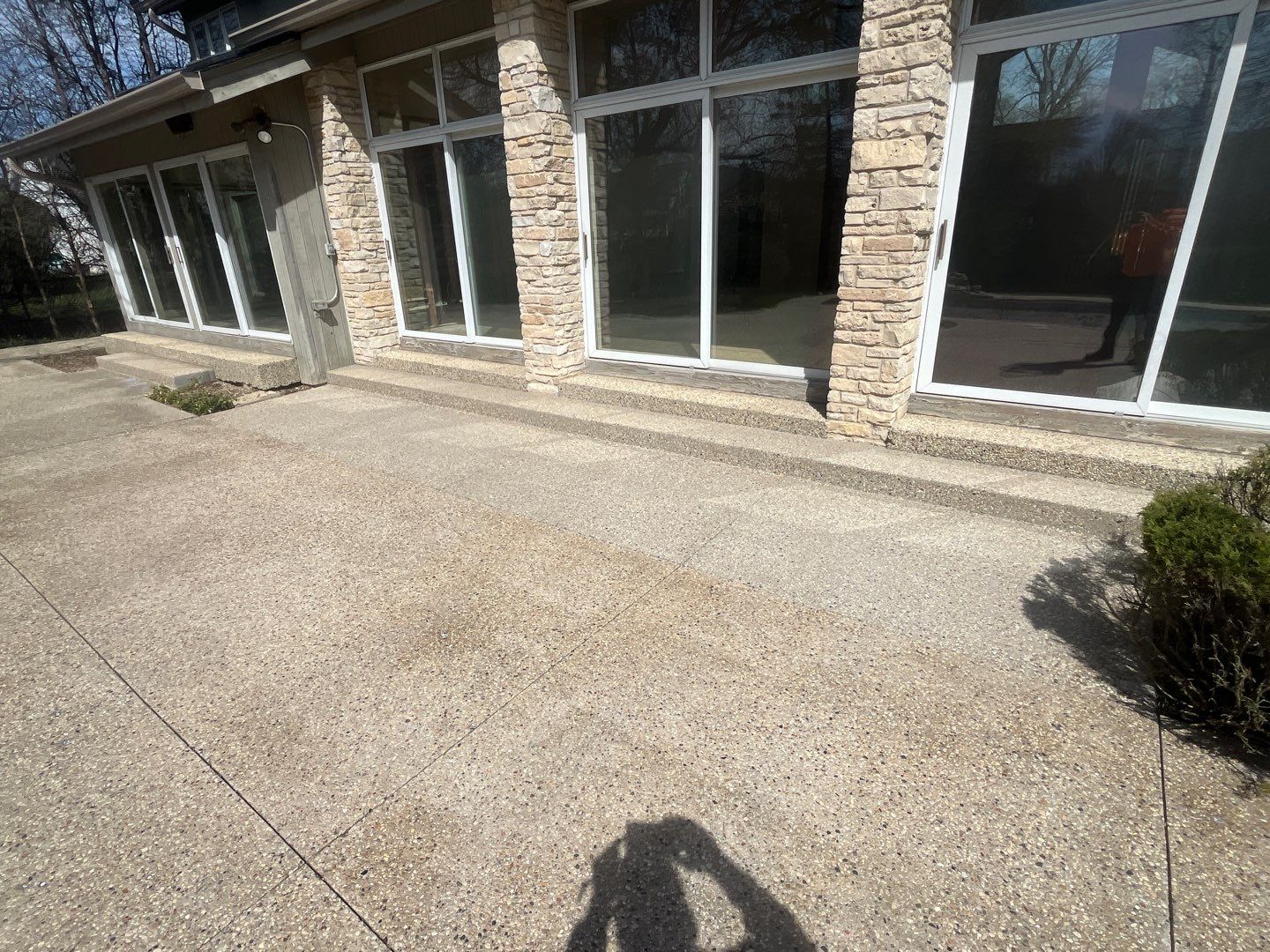 Aggregate Clean and seal using low gloss sealer by Northern Power Washing LLC.
