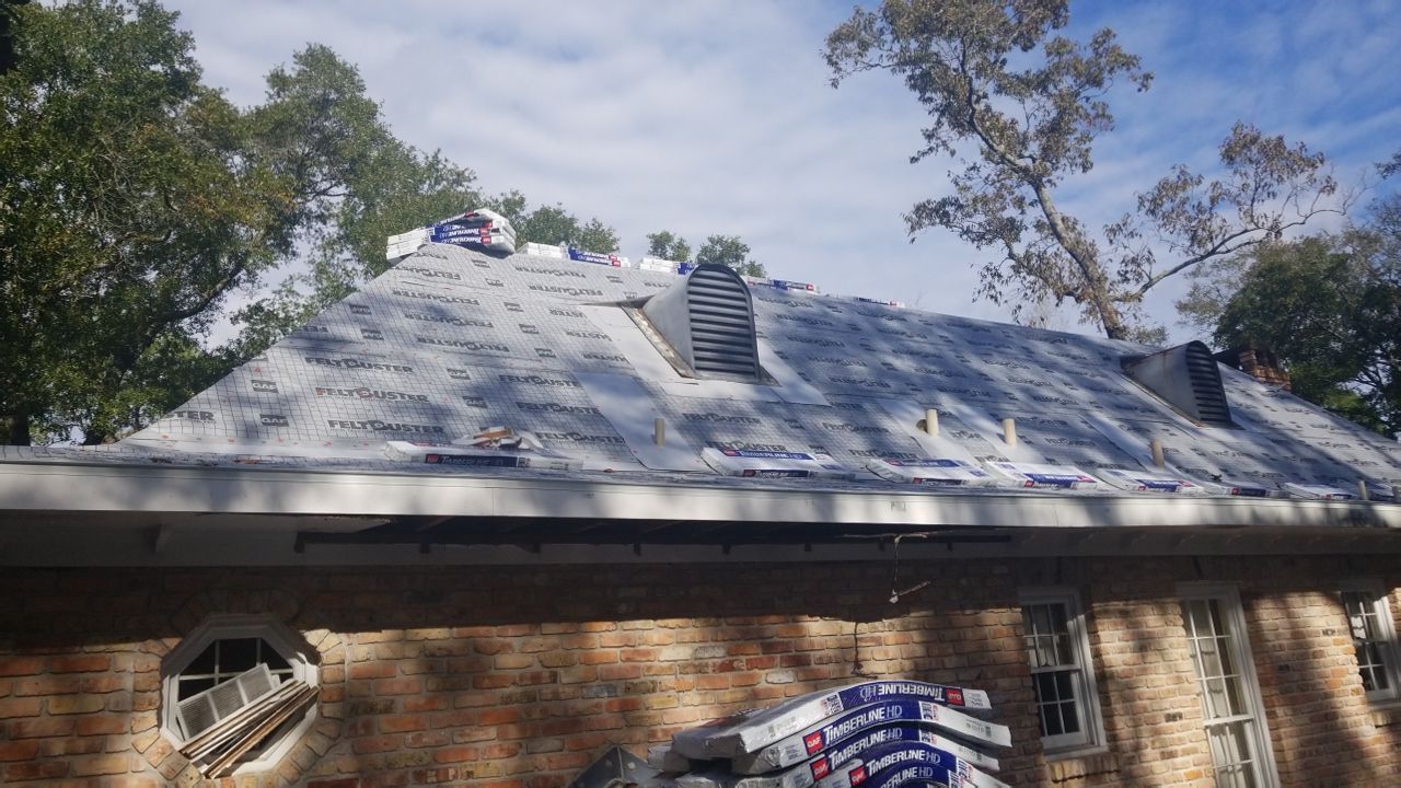 Residential Roofing Installation using Roof Replacement by American Roofing & Construction LLC