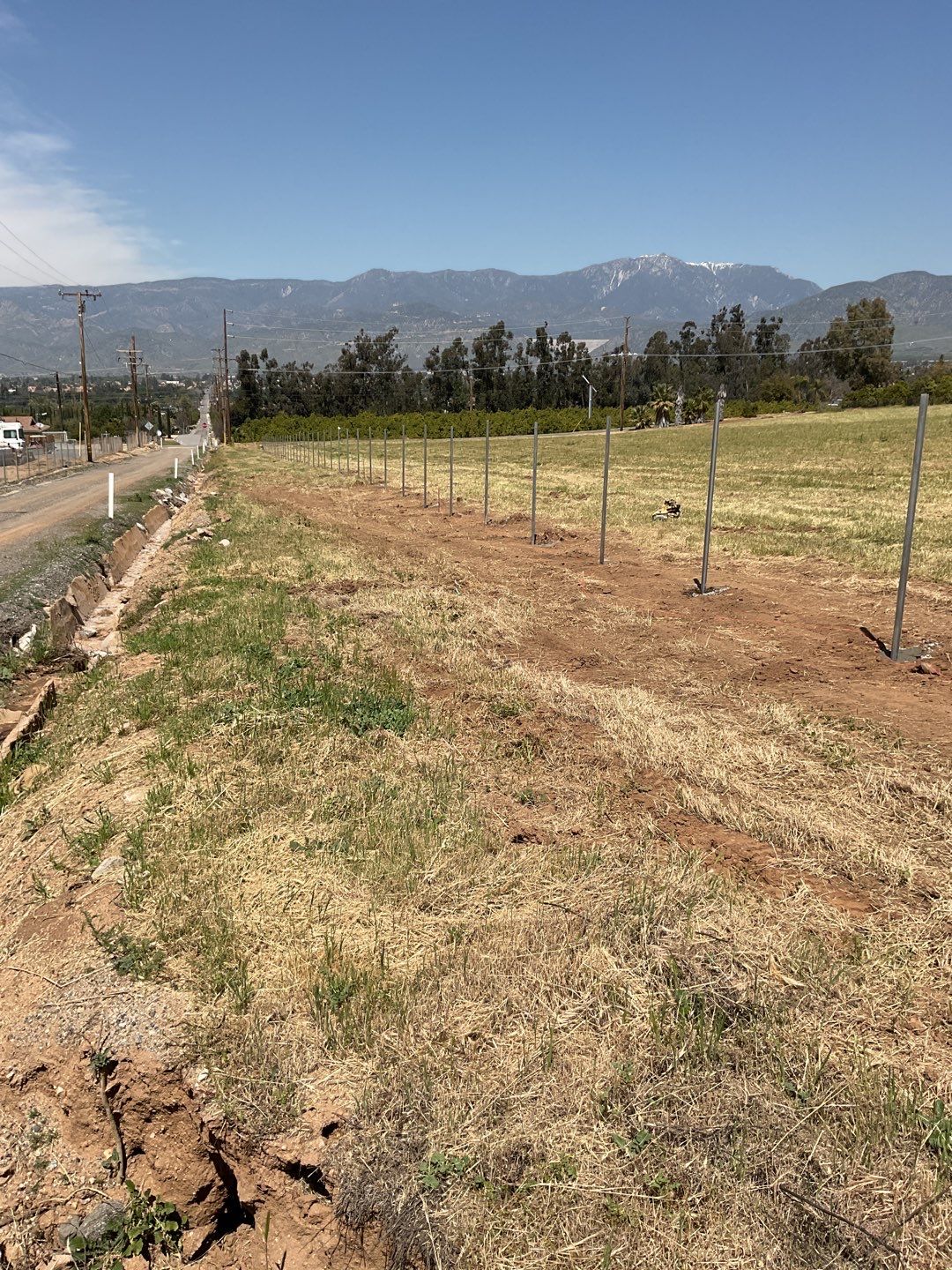 Fence installation using chain link wire by Fence Guys Inc. 