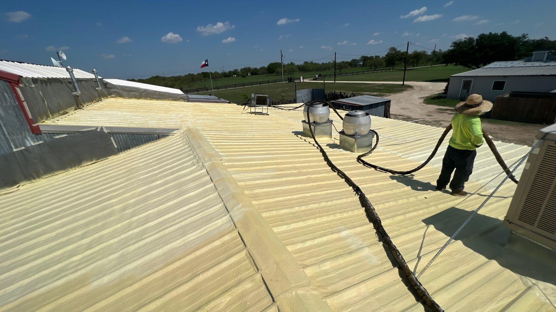 Commercial Roofing Repair using TRP #924 Eterna-Sil Premium Silicone Roof Coating by Harvey Roofing & Construction