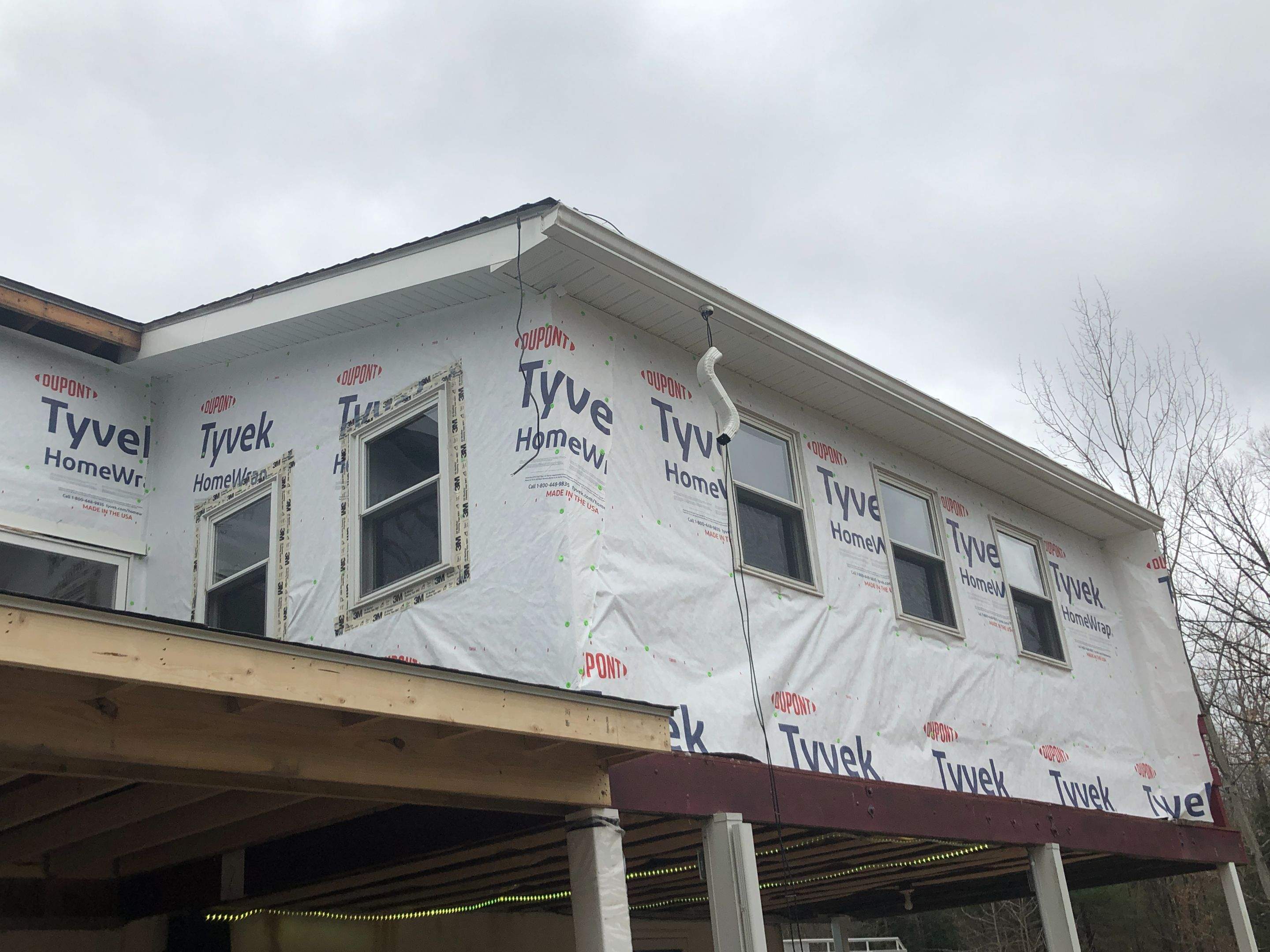 Sage Green Vinyl Siding and Exterior Trim Replacement in Ashland by Esh Builders