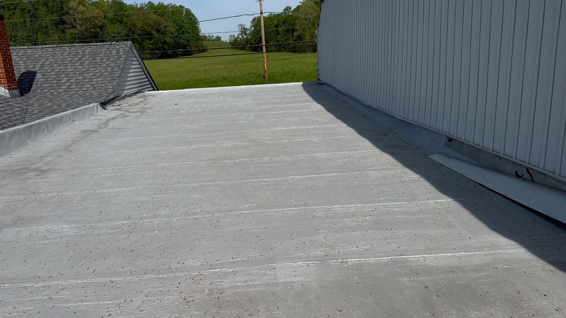 Roof Installation using Silicone APP Elevate Coating by ExteriorPros