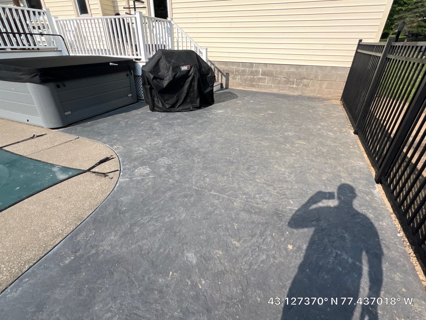 Bluestone stamped concrete patio  by NG Masonry & Construction LLC