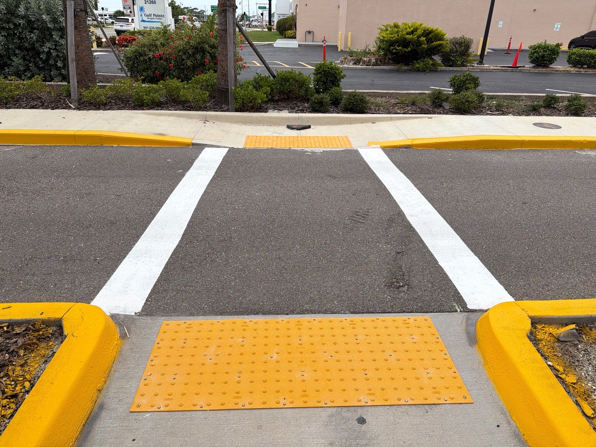 Sealcoating, Line Striping, Truncated Dome Installation - HCA Florida Fawcett Hospital by Everline Coatings & Services - Southwest FL