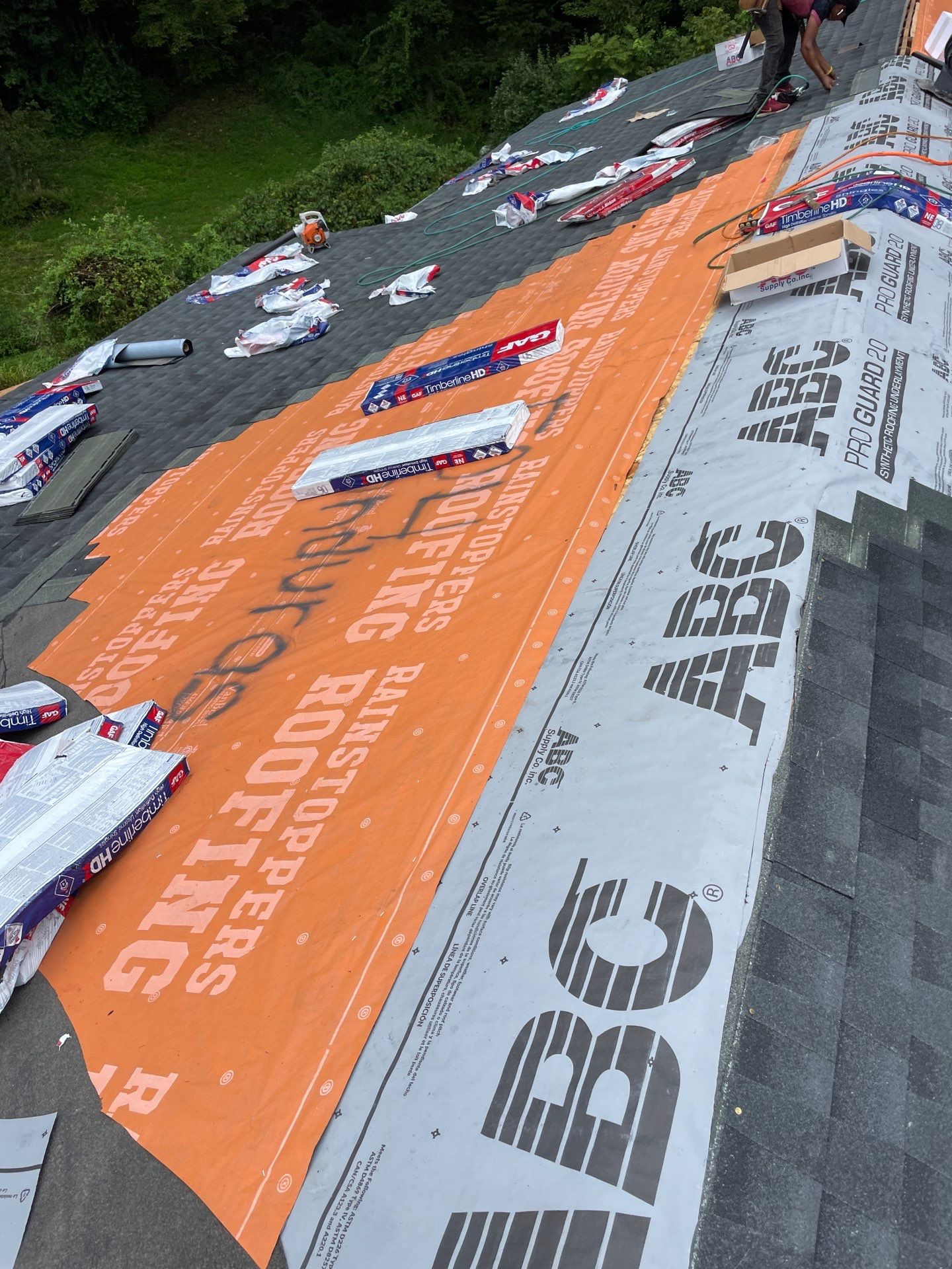 Residential Roofing Installation using GAF Timberline HDZ Charcoal by Rainstoppers Roofing