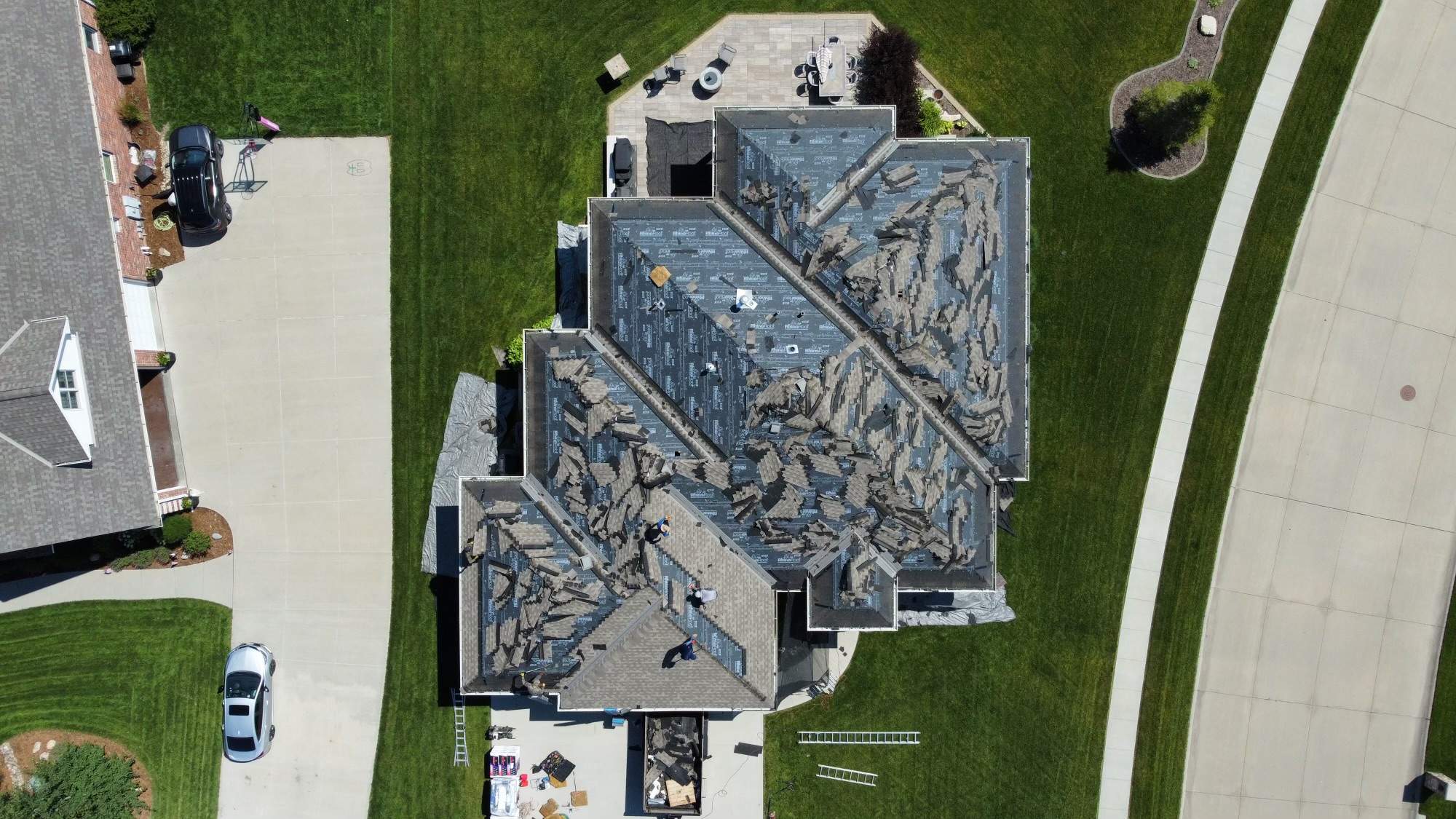 Residential Roofing Installation using TAMKO TITAN WEATHERED WOOD by Lightning Exteriors