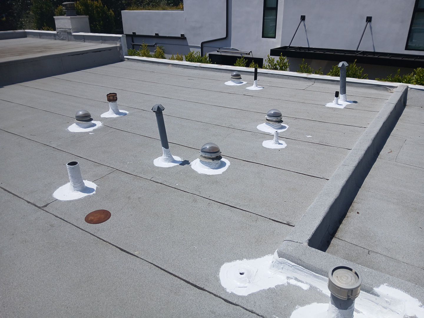 Silicone Membrane Installation using American Standard Coatings Silicone-S by Hull Brothers Roofing