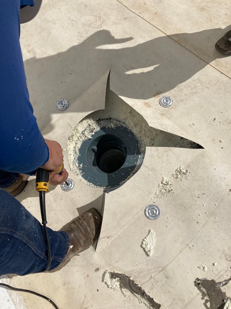 Drain Installation at CJ BIO by Grell Roofing, LLC