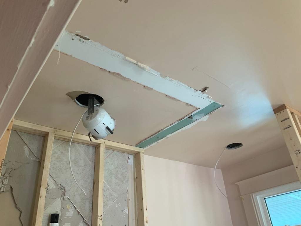 Bathroom Remodel using New Bathroom Tile and Tube by Alpha Design Services