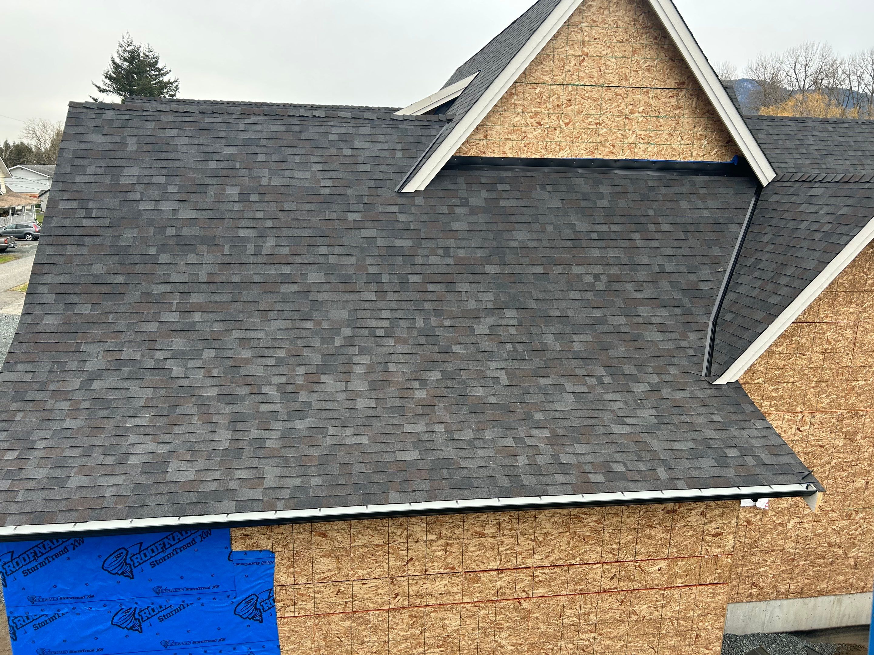 Residential Roofing Installation using Malarky Vista Shingles and Prolok Metal  by Top Notch Roofing Inc