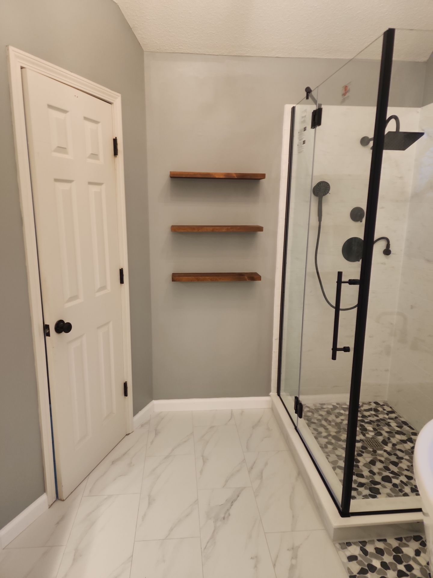 Beautiful use of many materials by The Shower Company