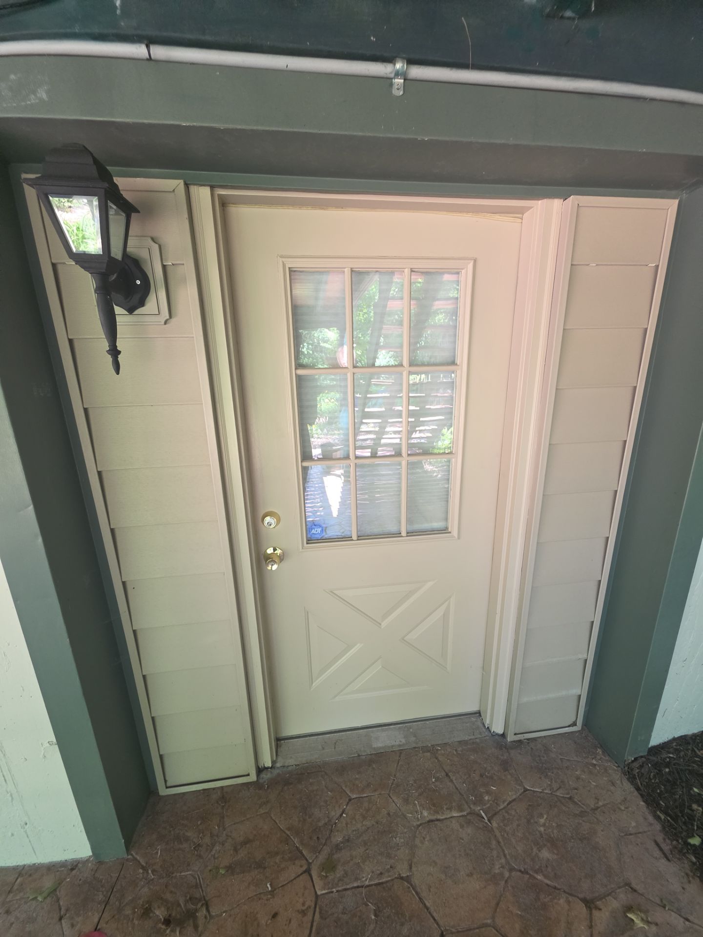 Exterior Entry Door and Garage Door Painting by Legendary Services Company LLC.
