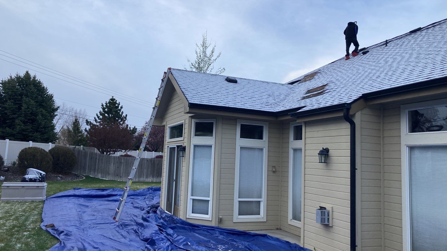 Beautifully maintained two story home with Duration Onyx Black located in Meridian by ID Roofing LLC