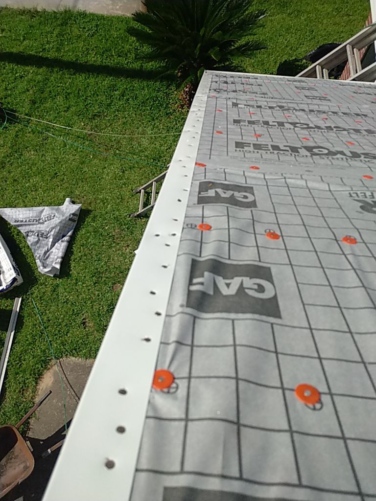 Residential Roofing Installation using Roof Replacement by American Roofing & Construction LLC
