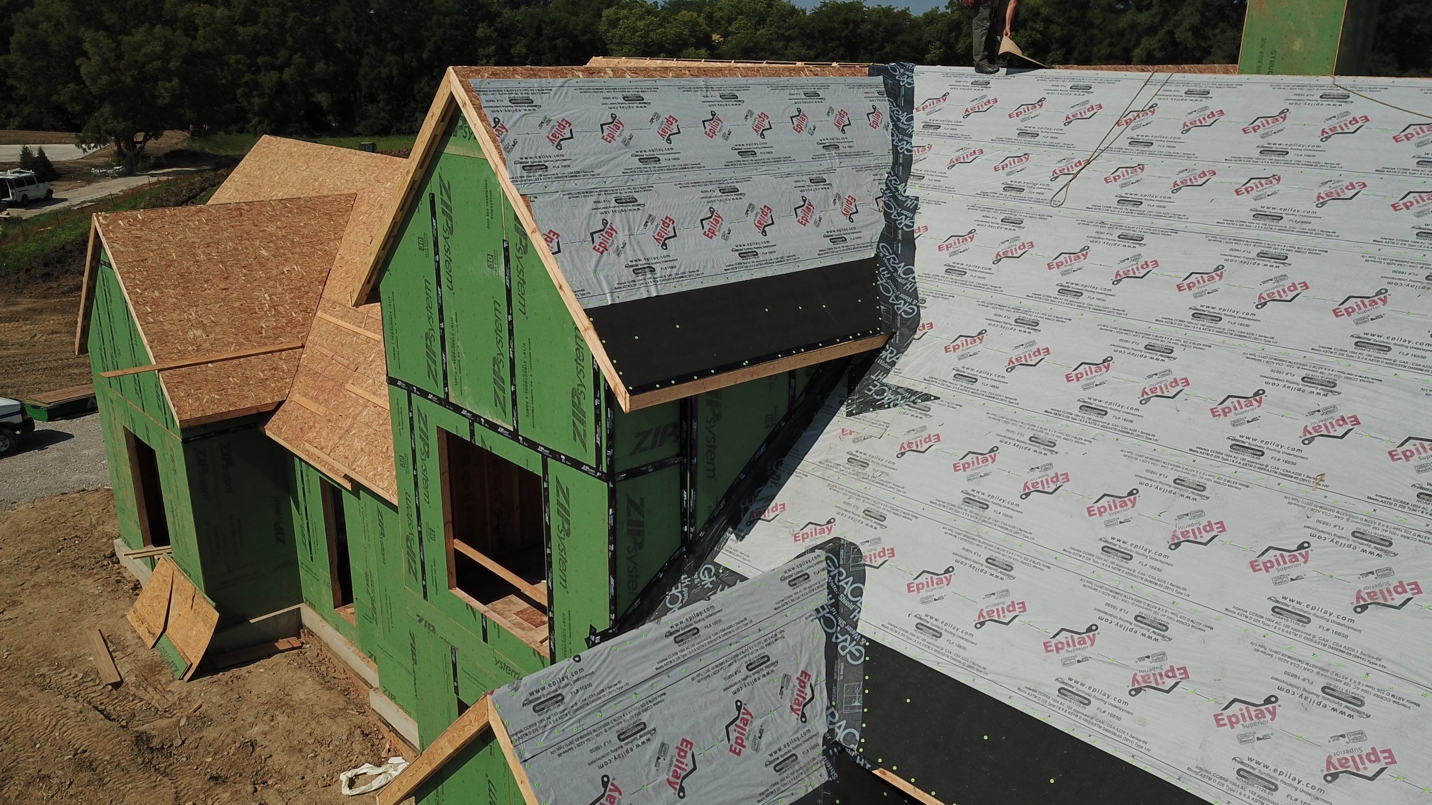 Residential Roofing Installation using Standing Seam Metal - Frost Black by RoofX 