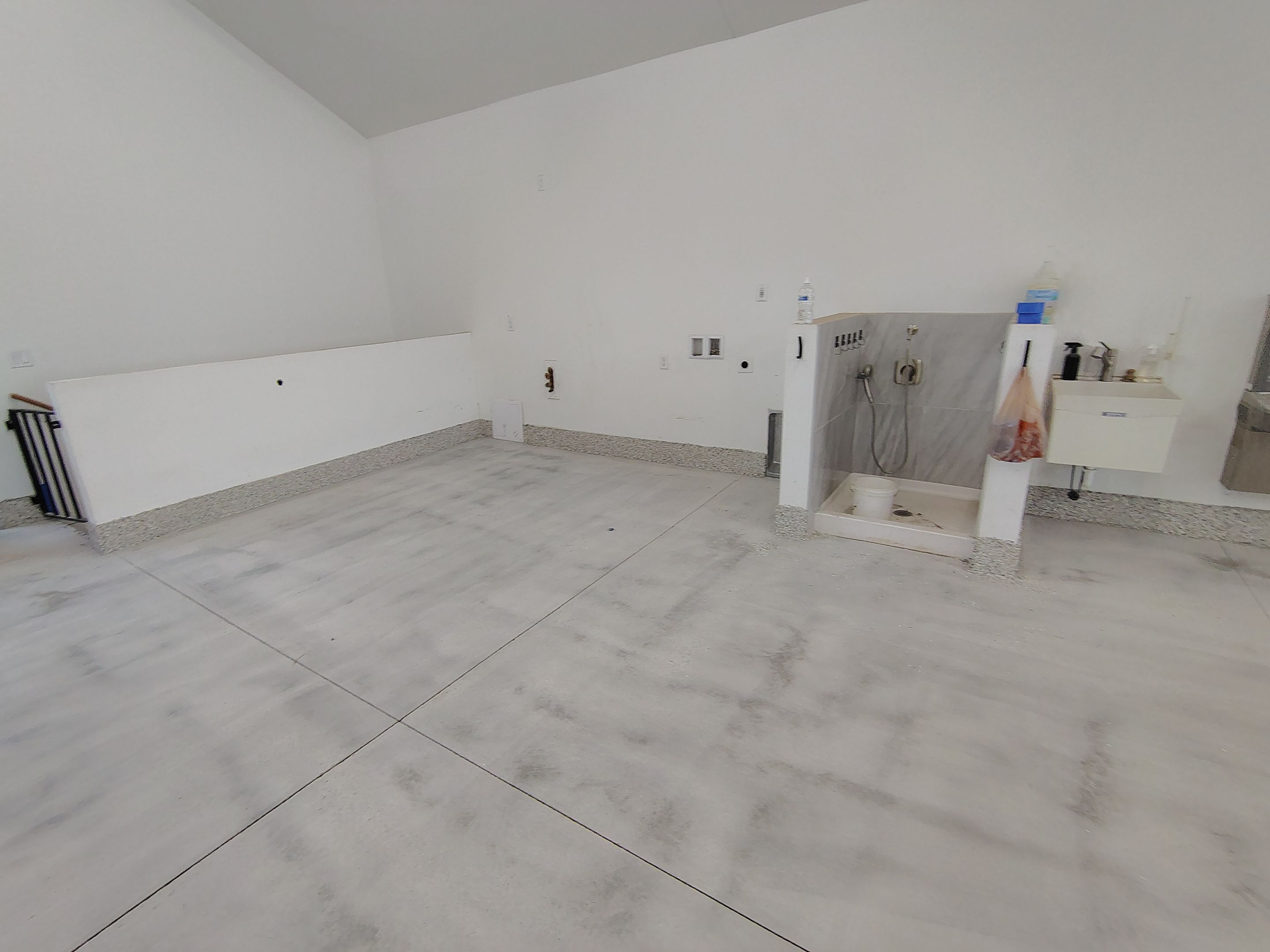 Epoxy Flake Garage Floor and Stair Coating in Sioux Falls by Select Painting, Coatings & Garage Cabinets