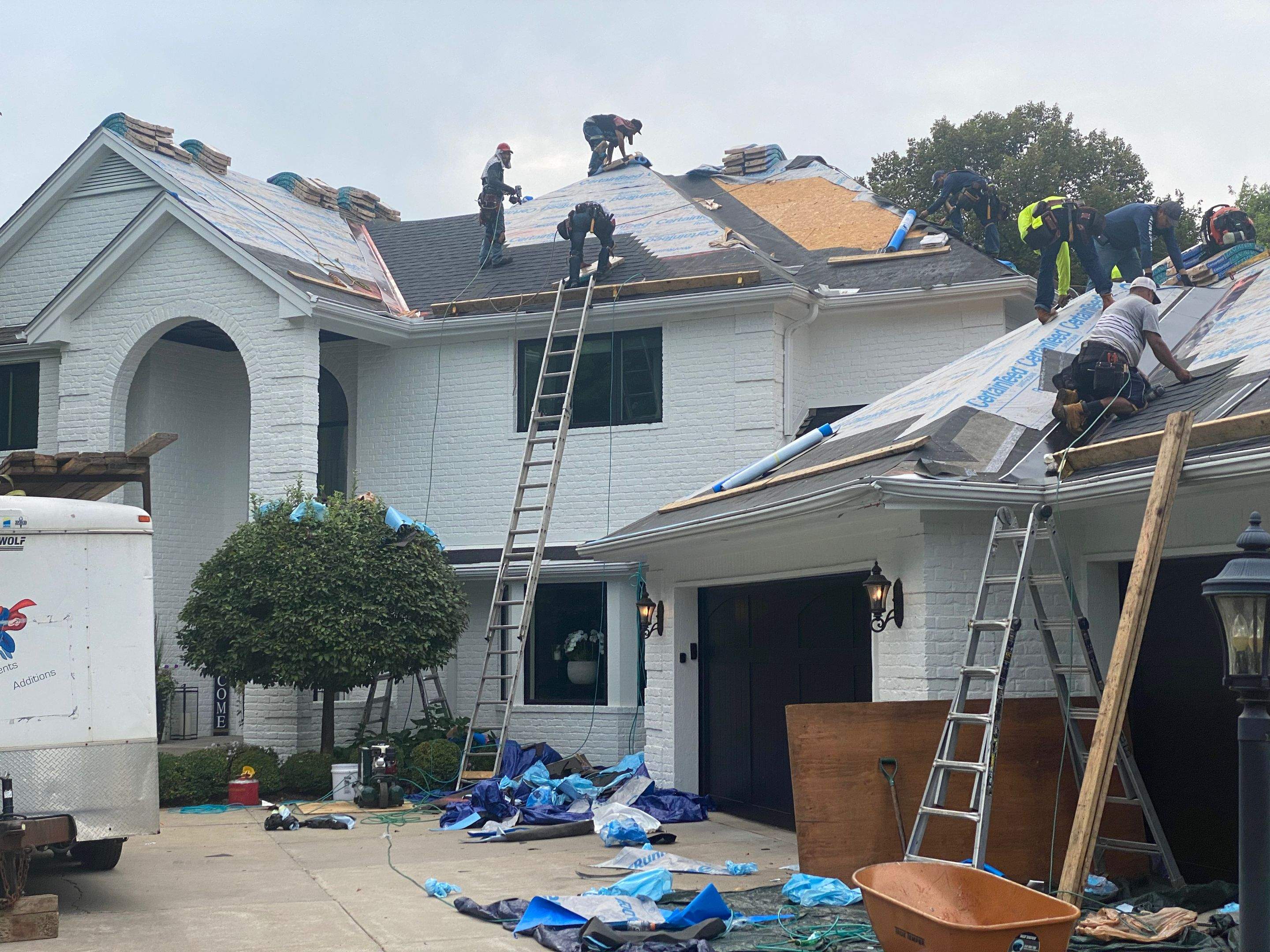 Residential Roofing Installation using Certainteed Landmark Moire Black by MODERN EXTERIOR SYSTEMS