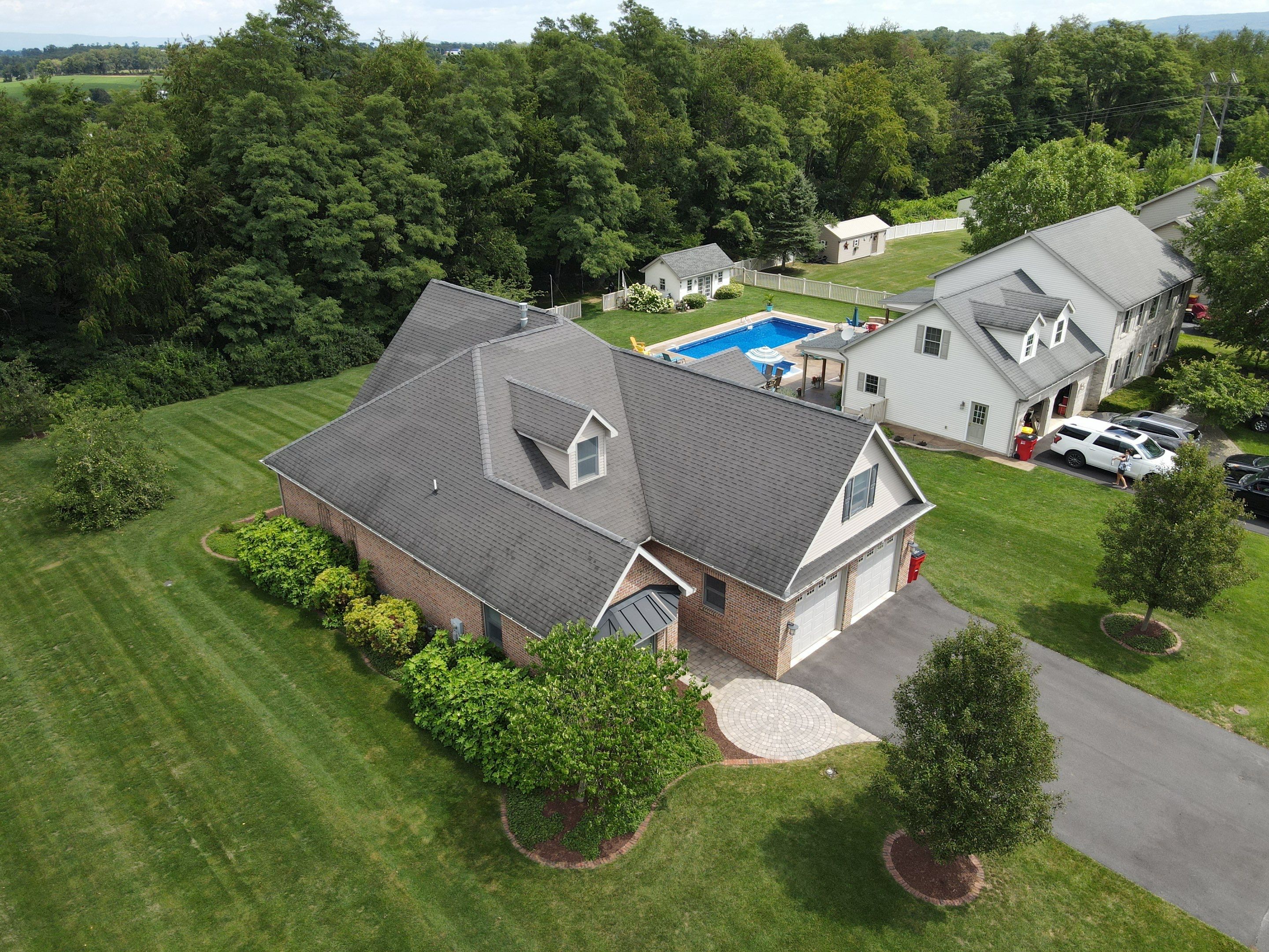 Standing seam / Azm panel in black  by Teflon Roofing