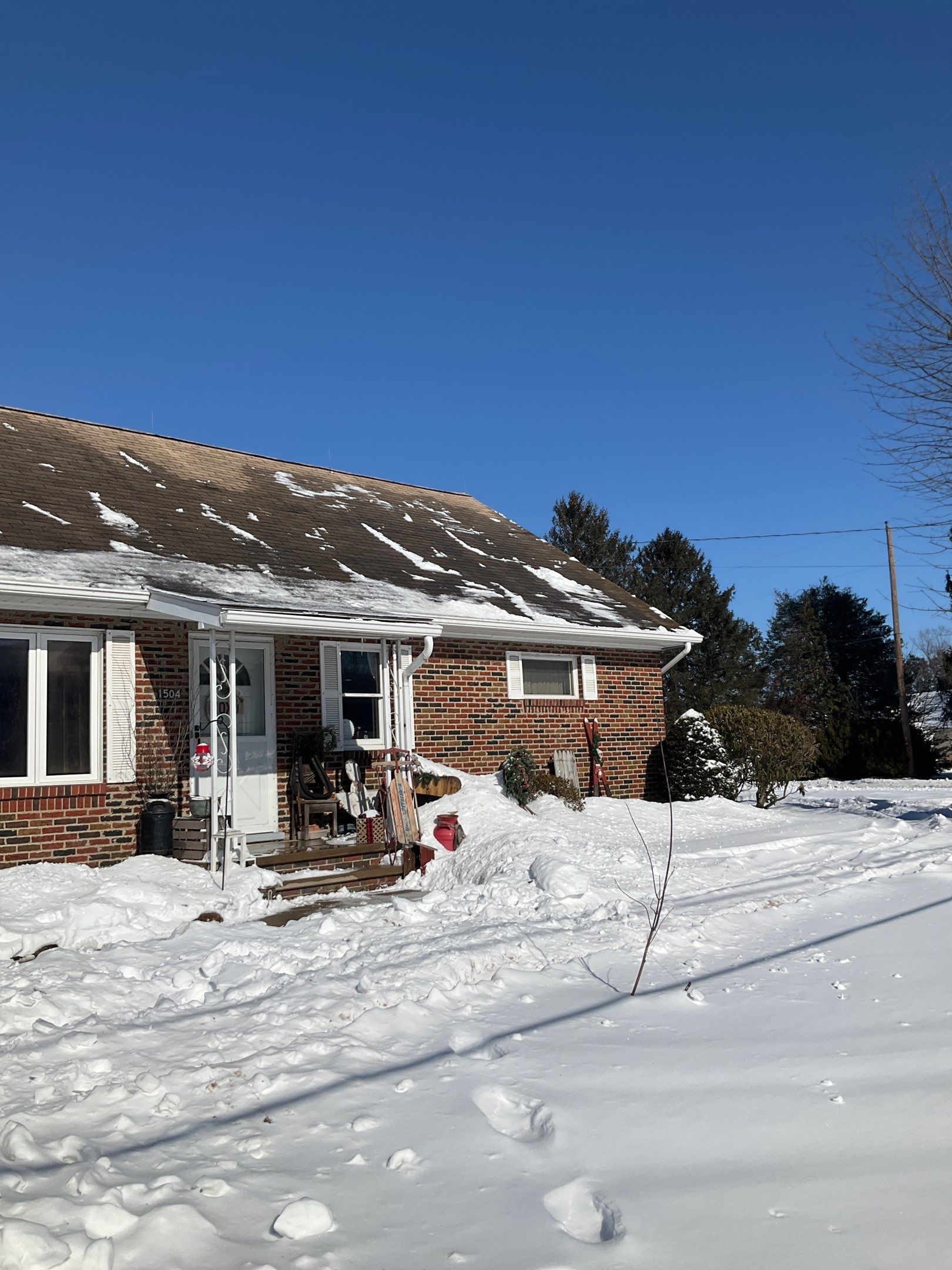 Tan Metal Roof and Gutter Replacement for Valley View Home by Esh Builders