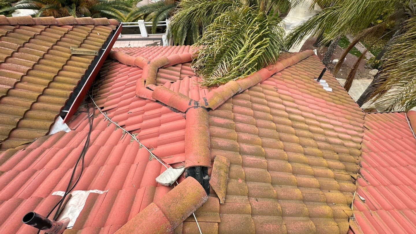 Tile refurbish project using existing tiles and replaced underlayment and battens by Straight Edge Roofing Inc